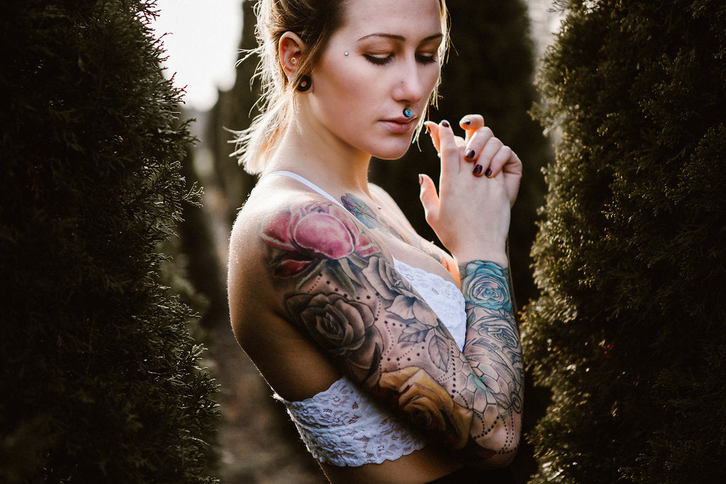 Model With Stretched Ears Wearing Ear Weights