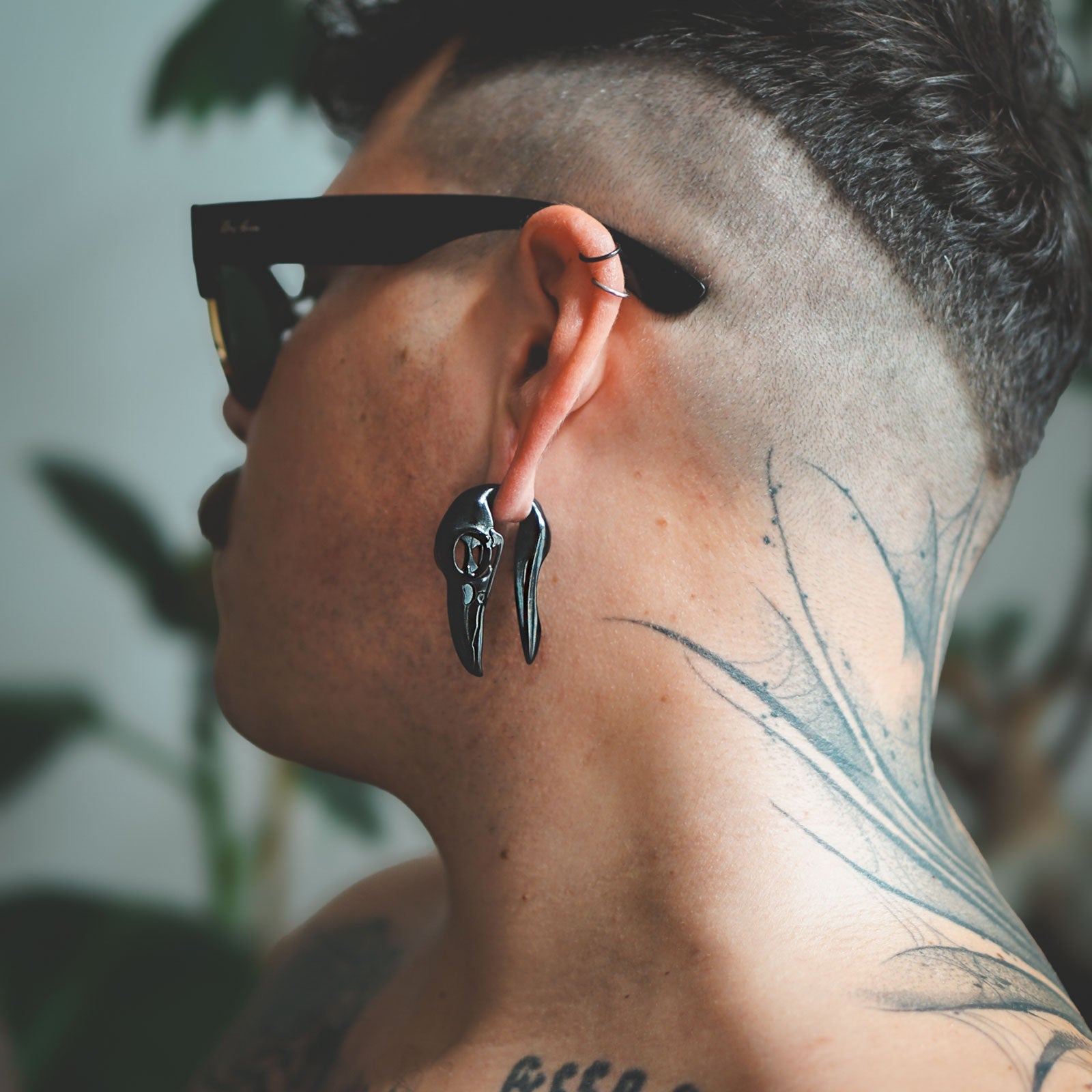 Model With Stretched Ears Wearing Ear Weights