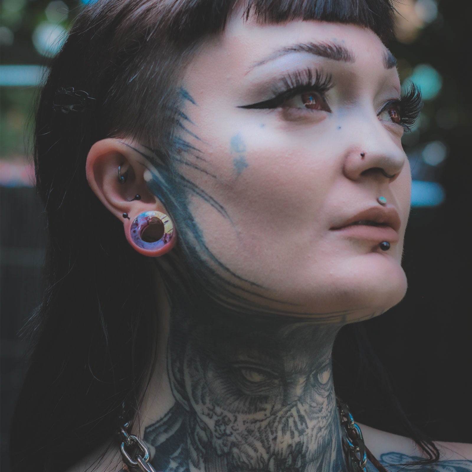 Model With Stretched Ears Wearing Wooden Flesh Tunnels