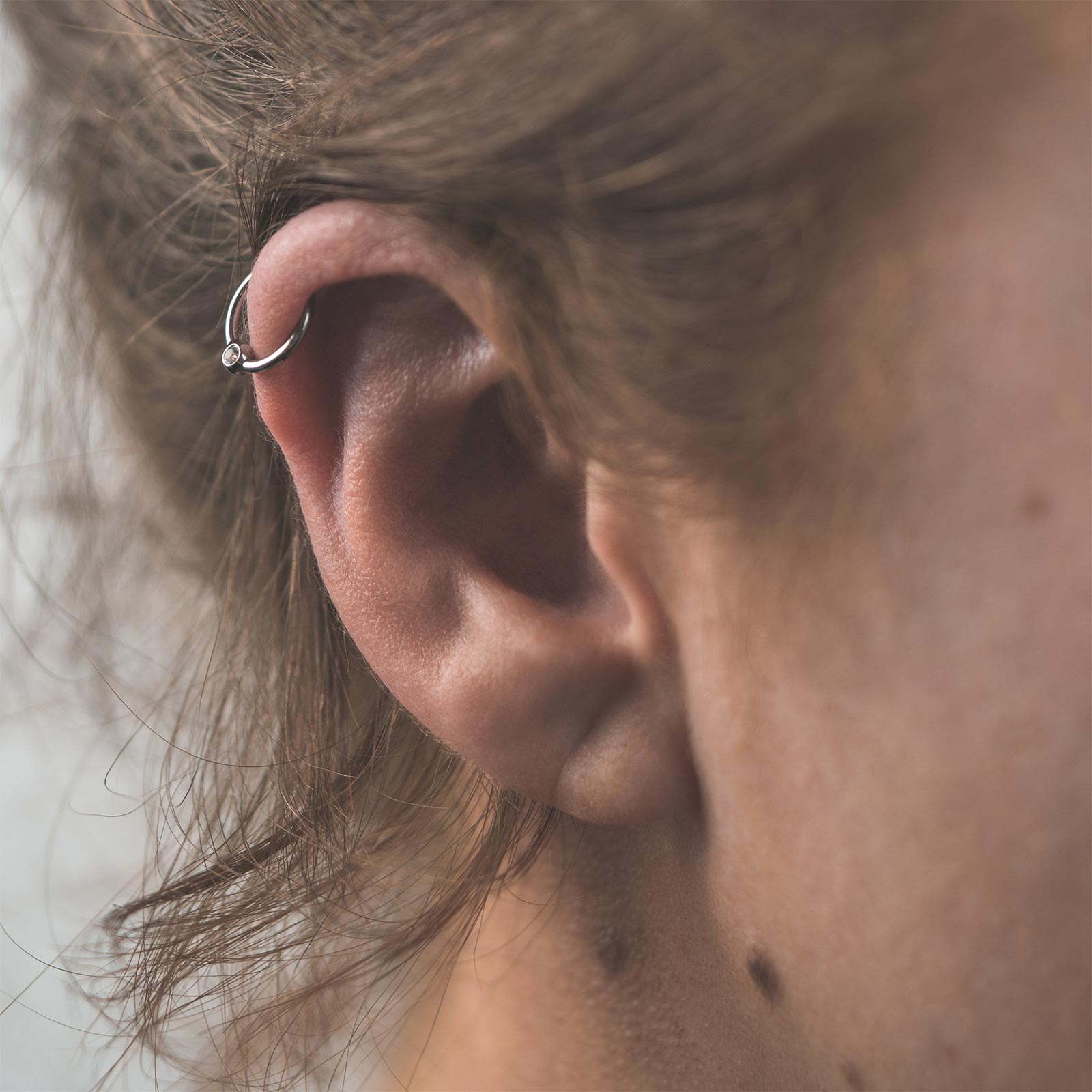 Model With Helix Piercing
