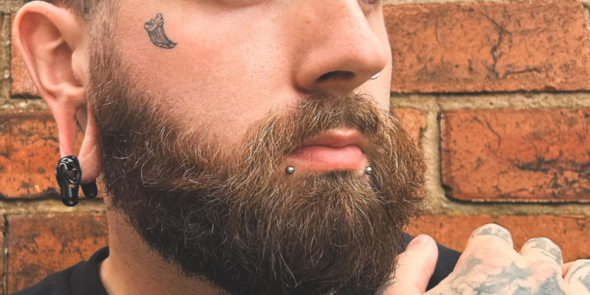 Snake bites piercing jewellery - paired labret studs under the bottom lip