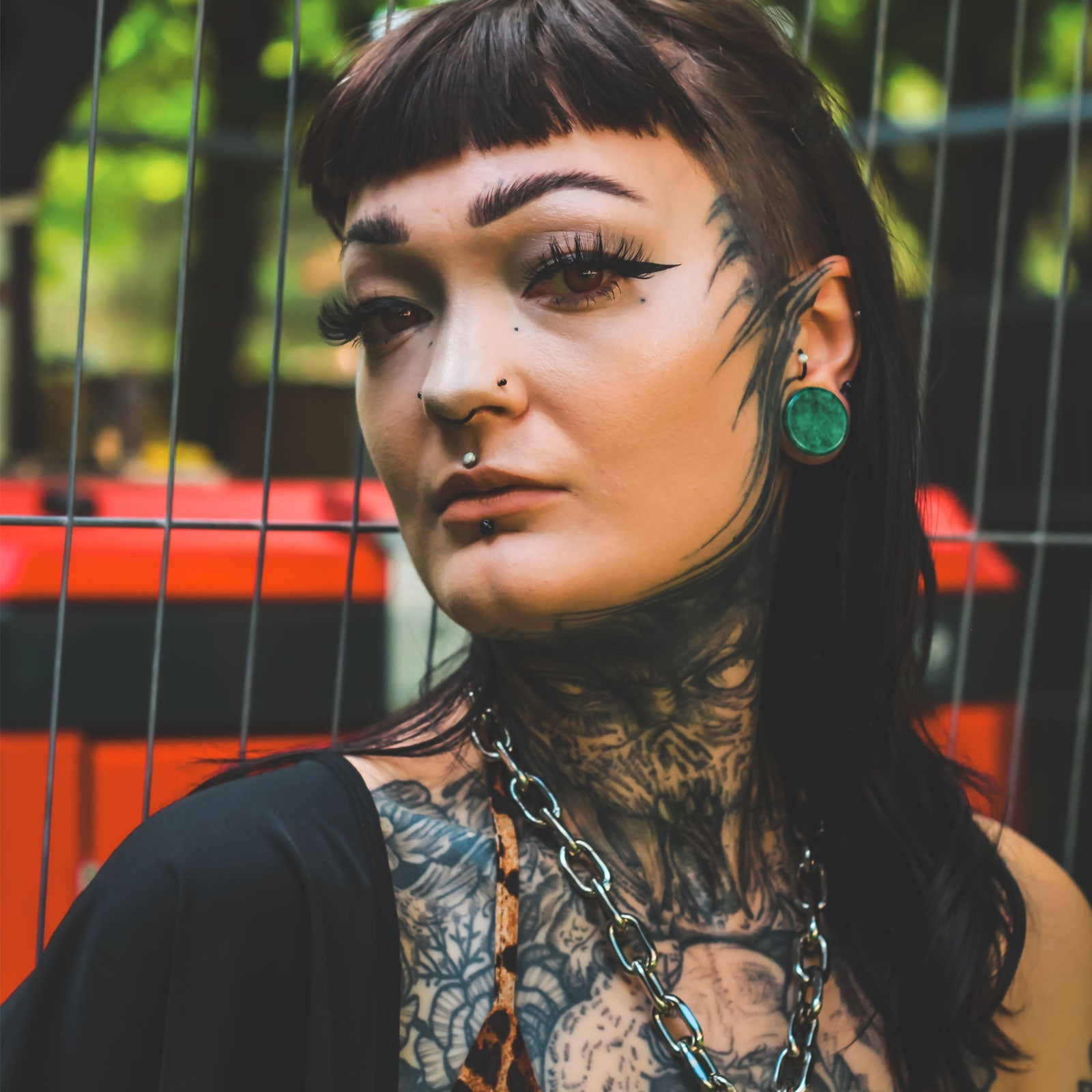 model wearing stone plugs