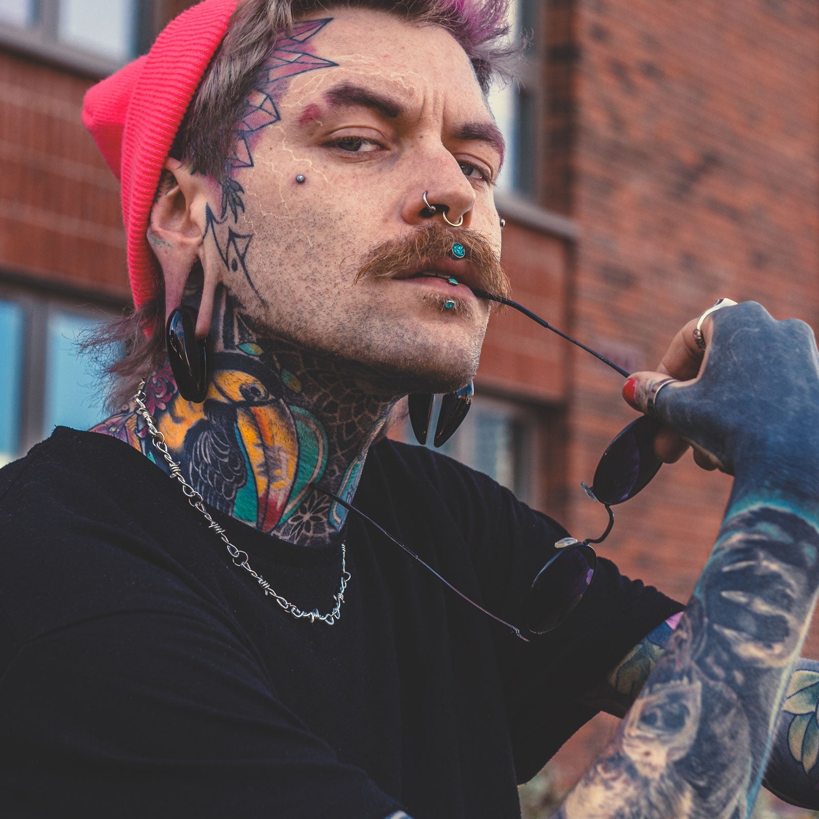 model wearing stone ear hangers