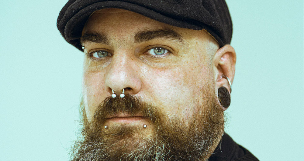 model wearing circular barbell