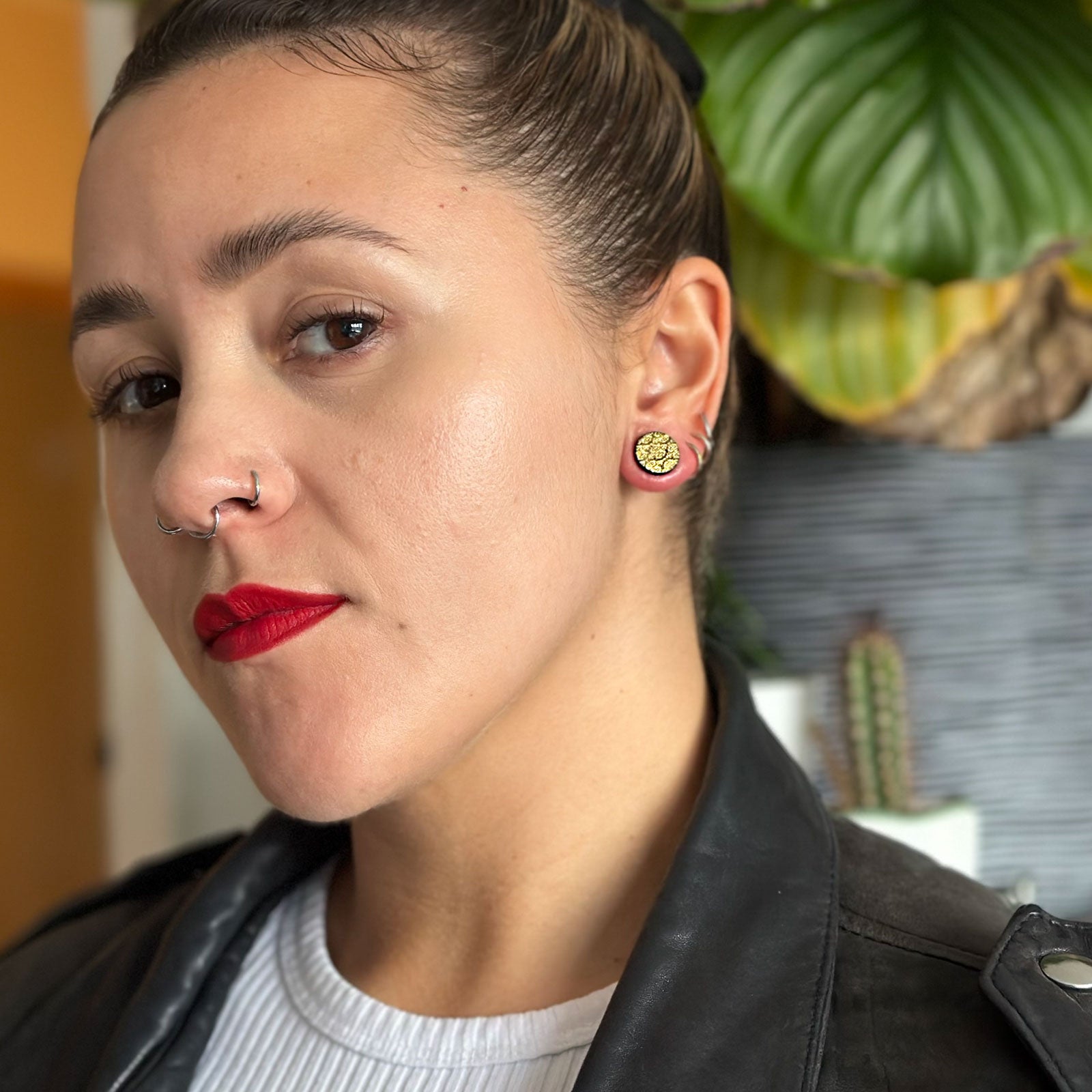 Areng Wood Double Flare Plug With Laser Engraved Gold Regal Pattern Model Shot