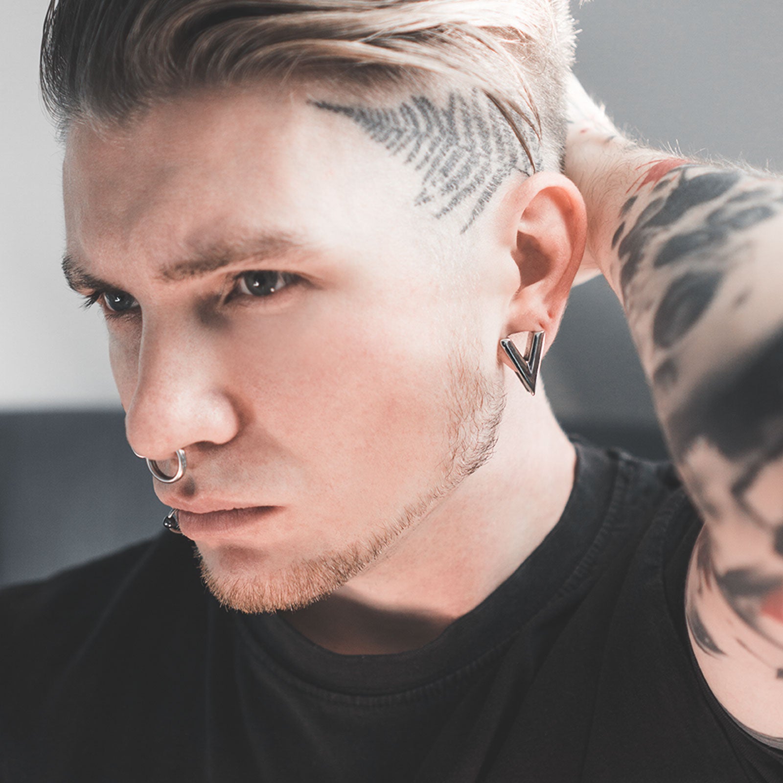 Arrowhead Surgical Steel Ear Weight Model Shot