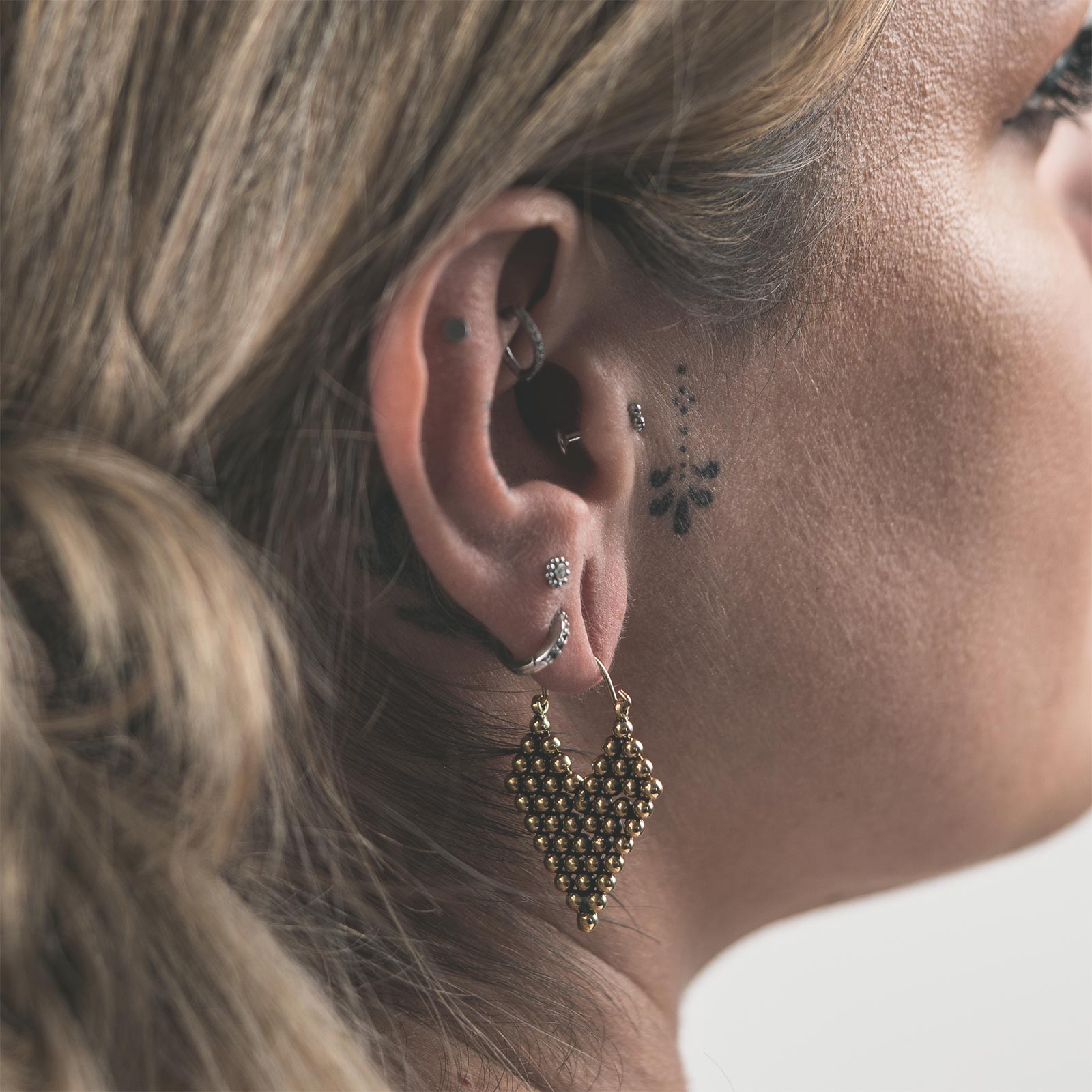 Beaded Arrowhead Brass Plug Hoops Model Shot