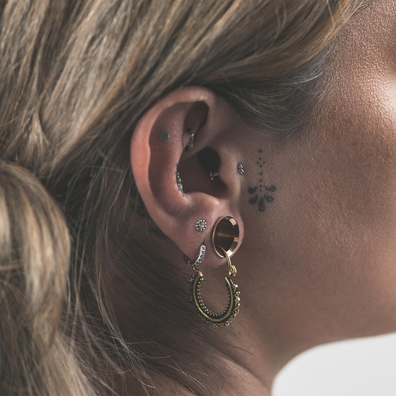 Beaded Regal Brass Plug Hoops Model Shot