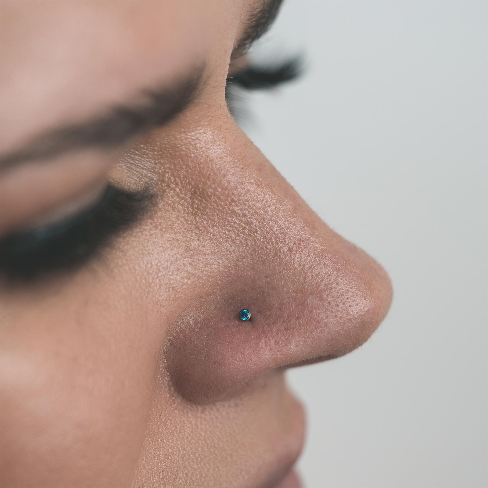 Bezel Set Aqua Jewelled Titanium Threadless Top Model Shot