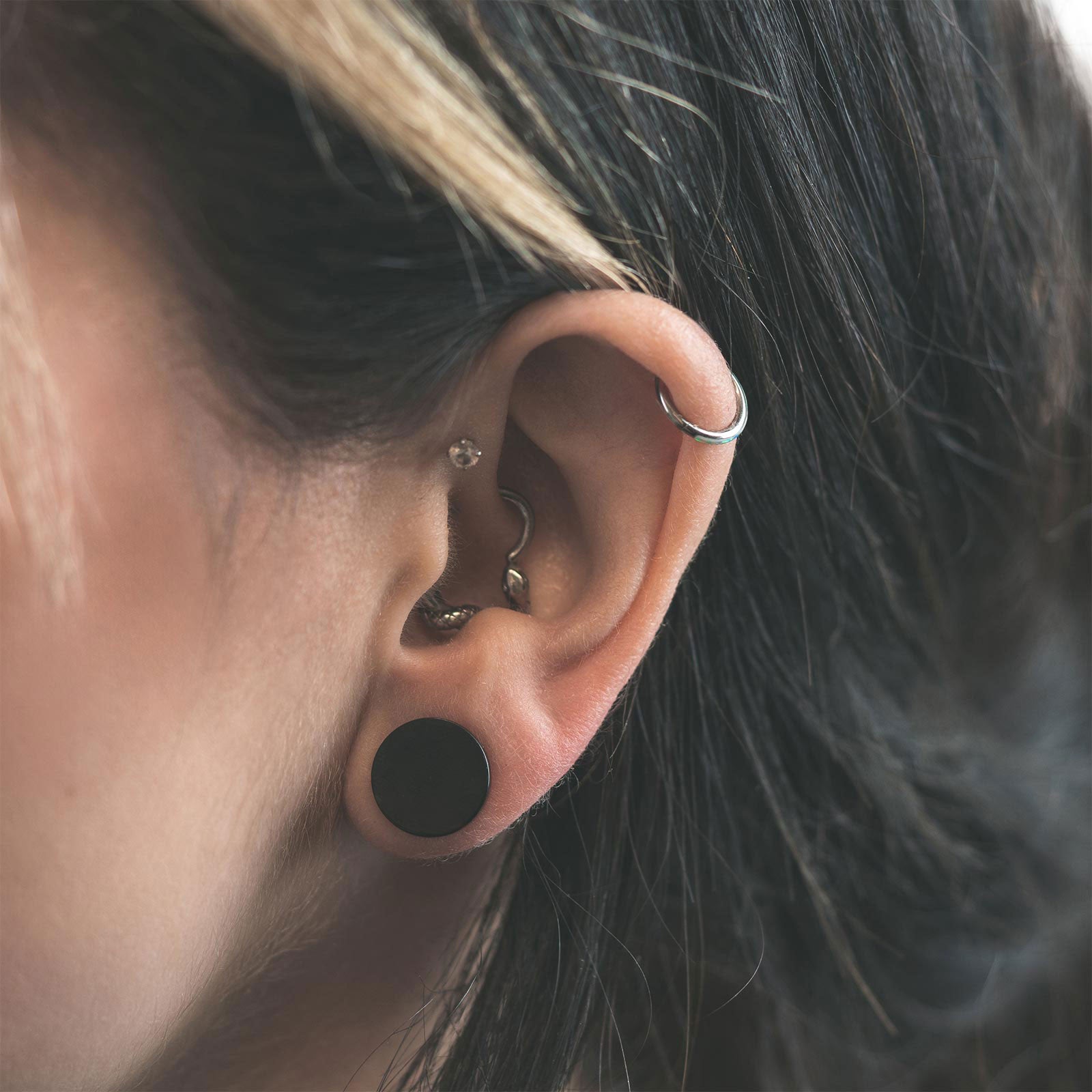 Black PVD Single Flare Dead Stretching Plug Model Shot Close Up