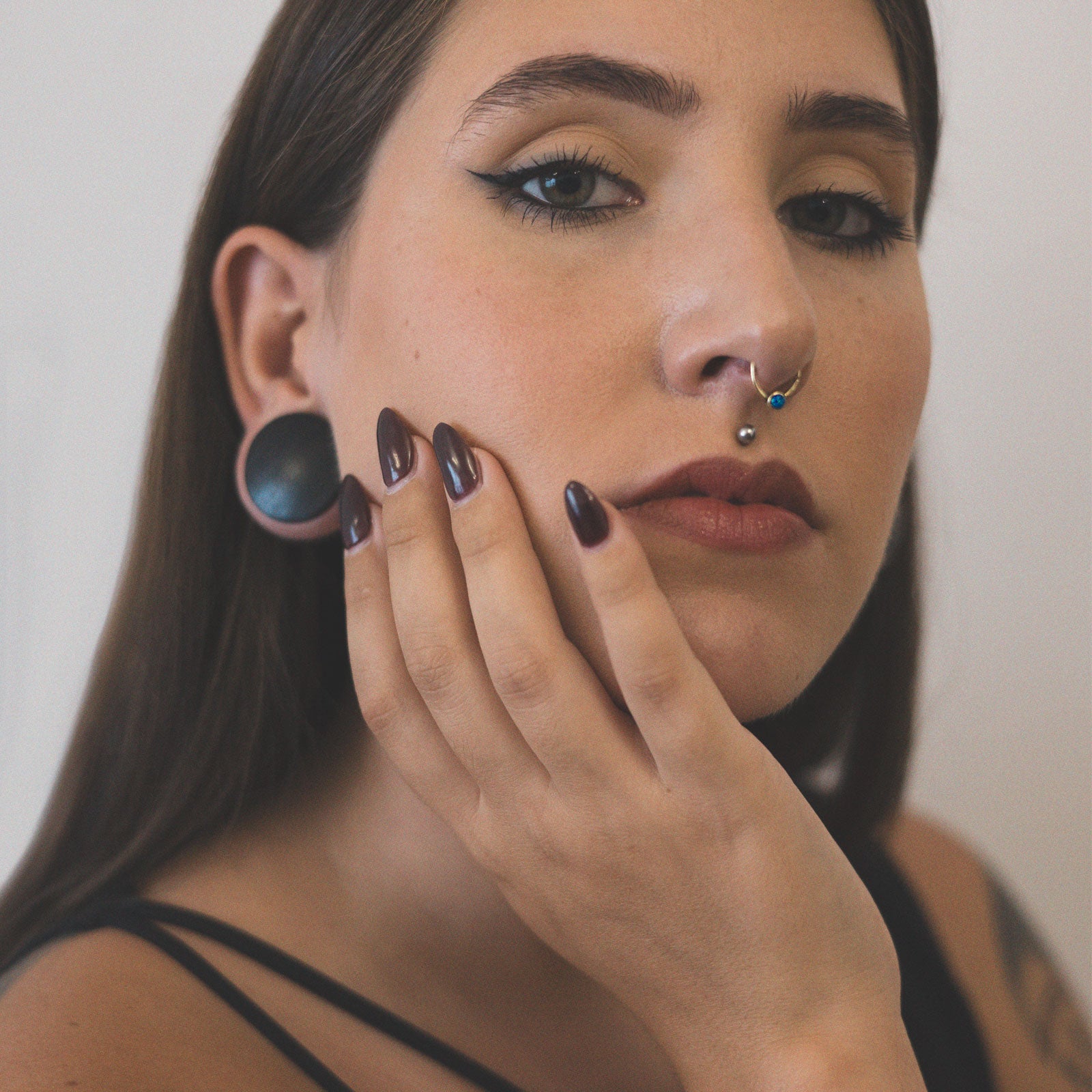 Blue Synth Opal & Brass Seamless Septum Ring Model Shot