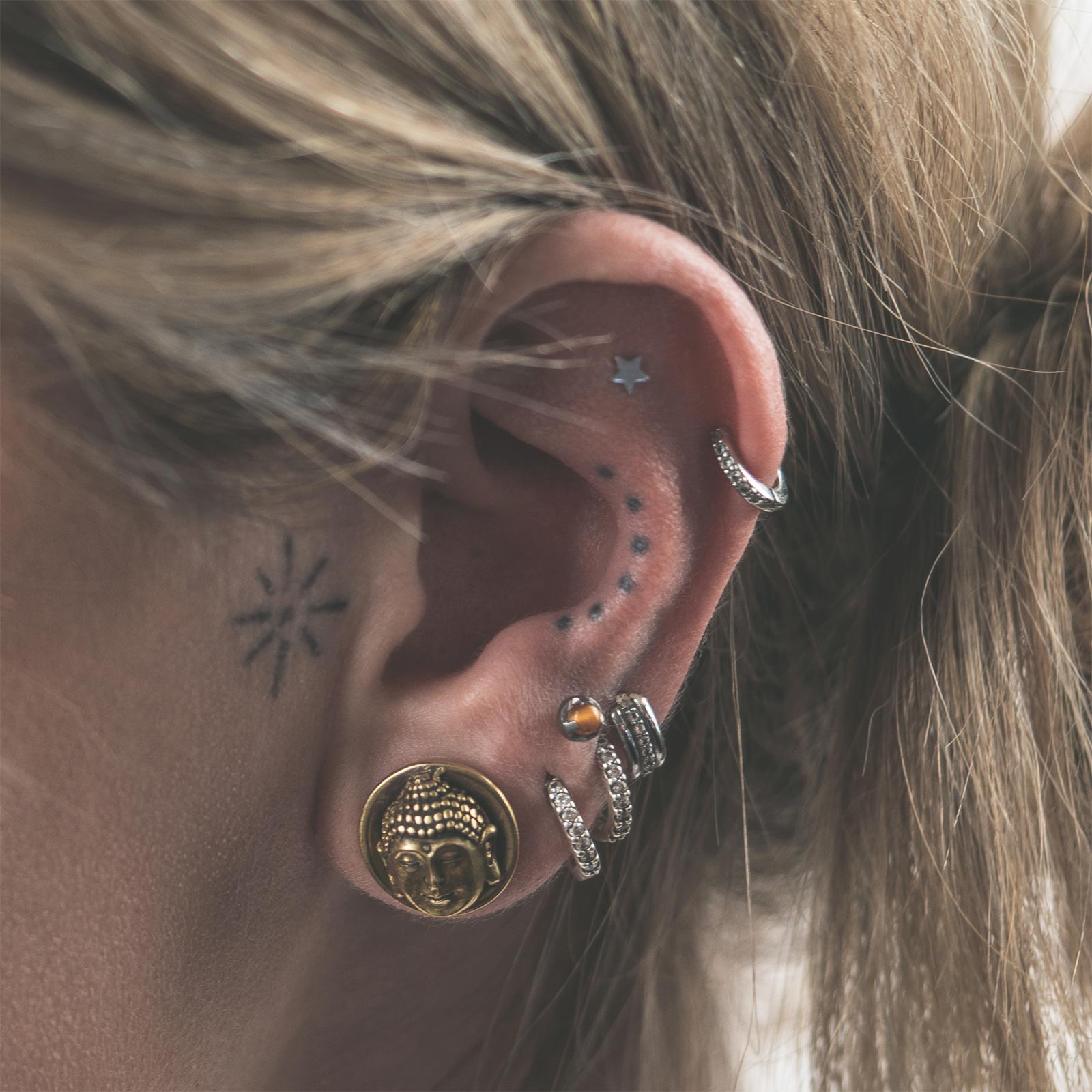 Brass Buddha Head Double Flare Tunnel Model Shot