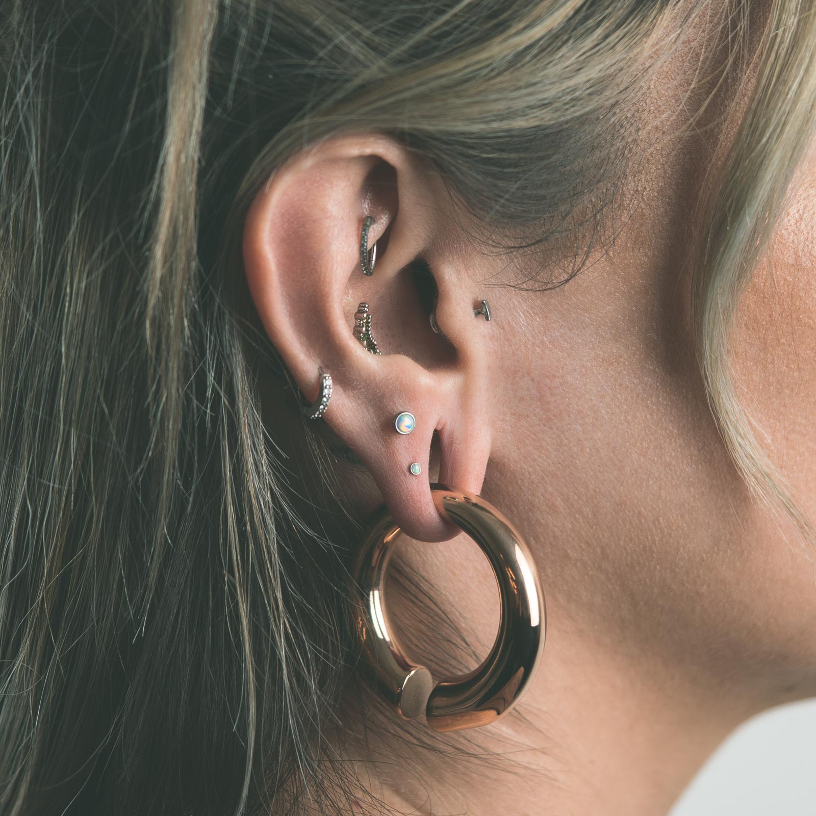 Circular Rose Gold PVD Surgical Steel Ear Weight Model Shot