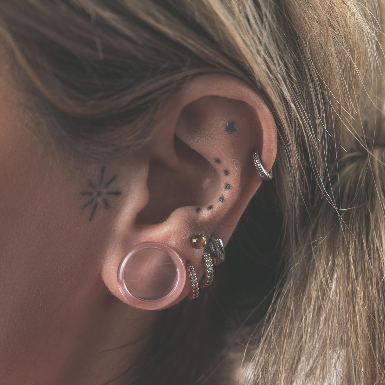 Clear Pink Glass Single Flare Convex Plug Model Shot