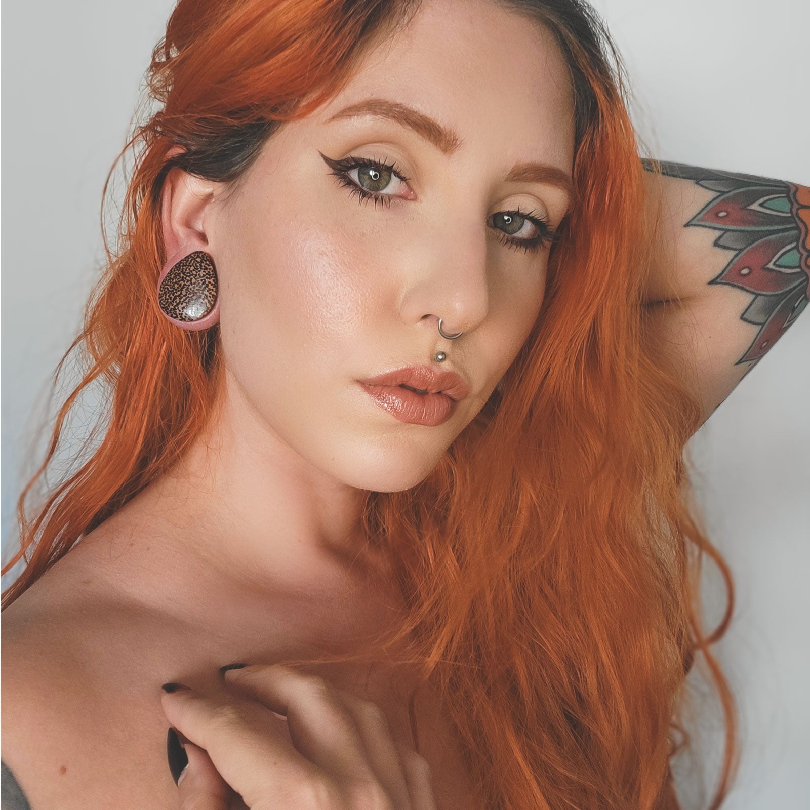 Coconut Wood Double Flare Convex Teardrop Plug Model Shot