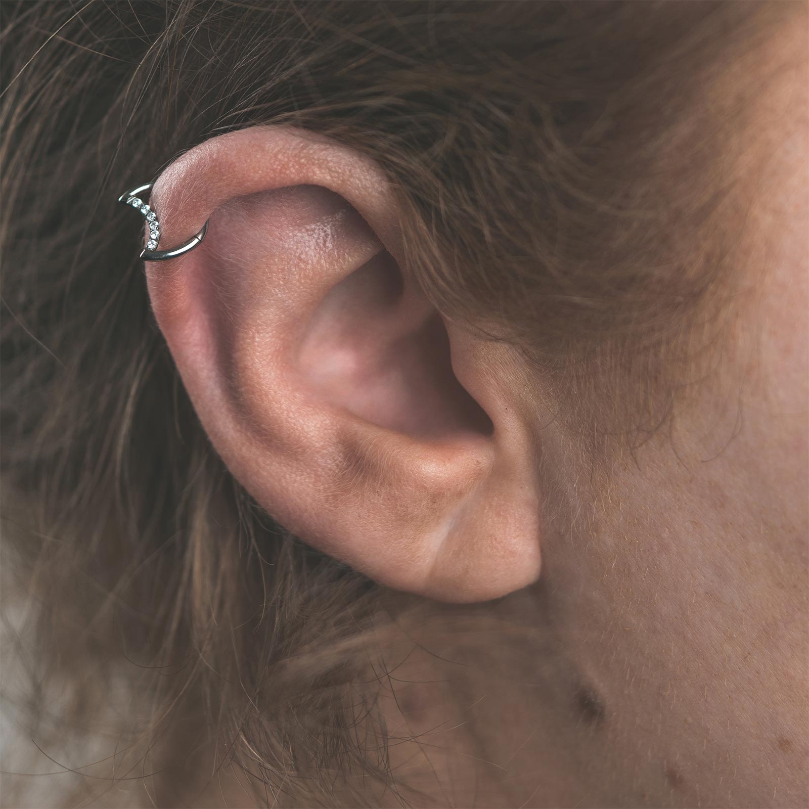 Crescent Bejewelled Titanium Hinged Segment Daith Earring Model Shot