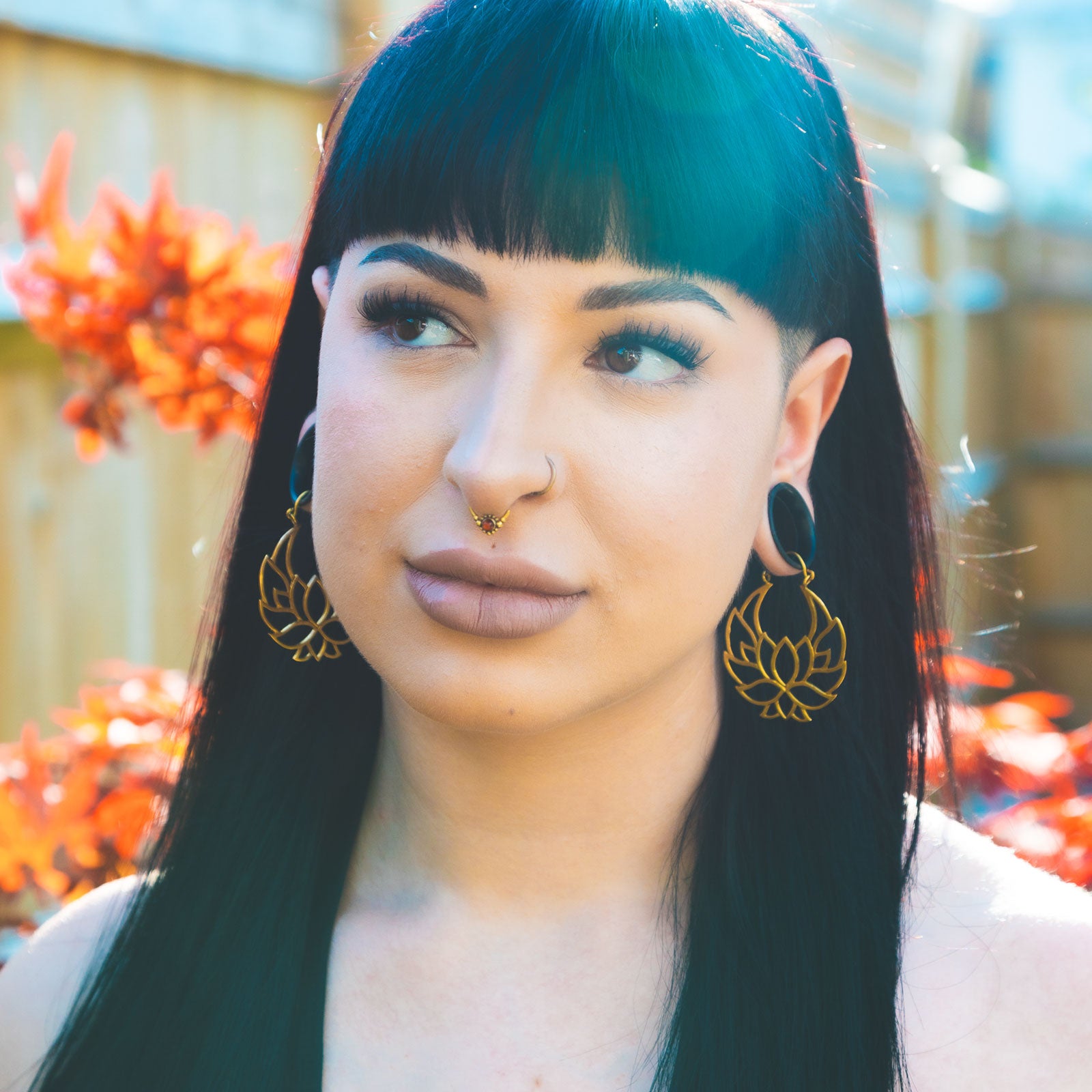 Dark Synth Ruby Drop & Brass Seamless Septum Ring Model Shot