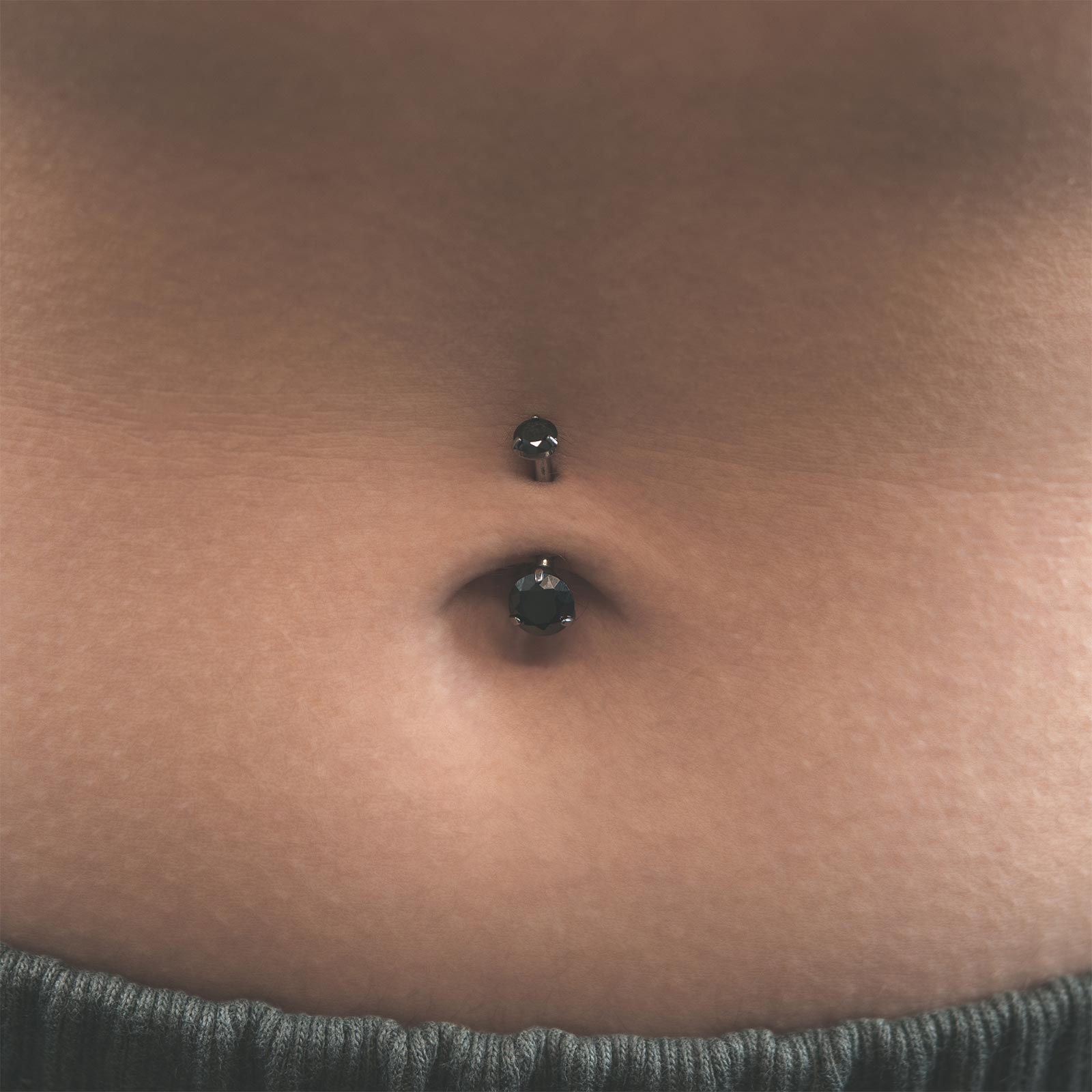 Double Black Jewelled Internally Threaded Titanium Belly Bar Model Shot