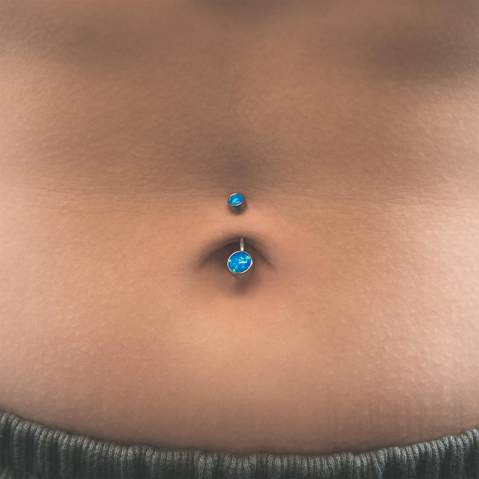 Double Pacific Blue Synth Opal Bezel Set Internally Threaded Titanium Belly Bar Model Shot