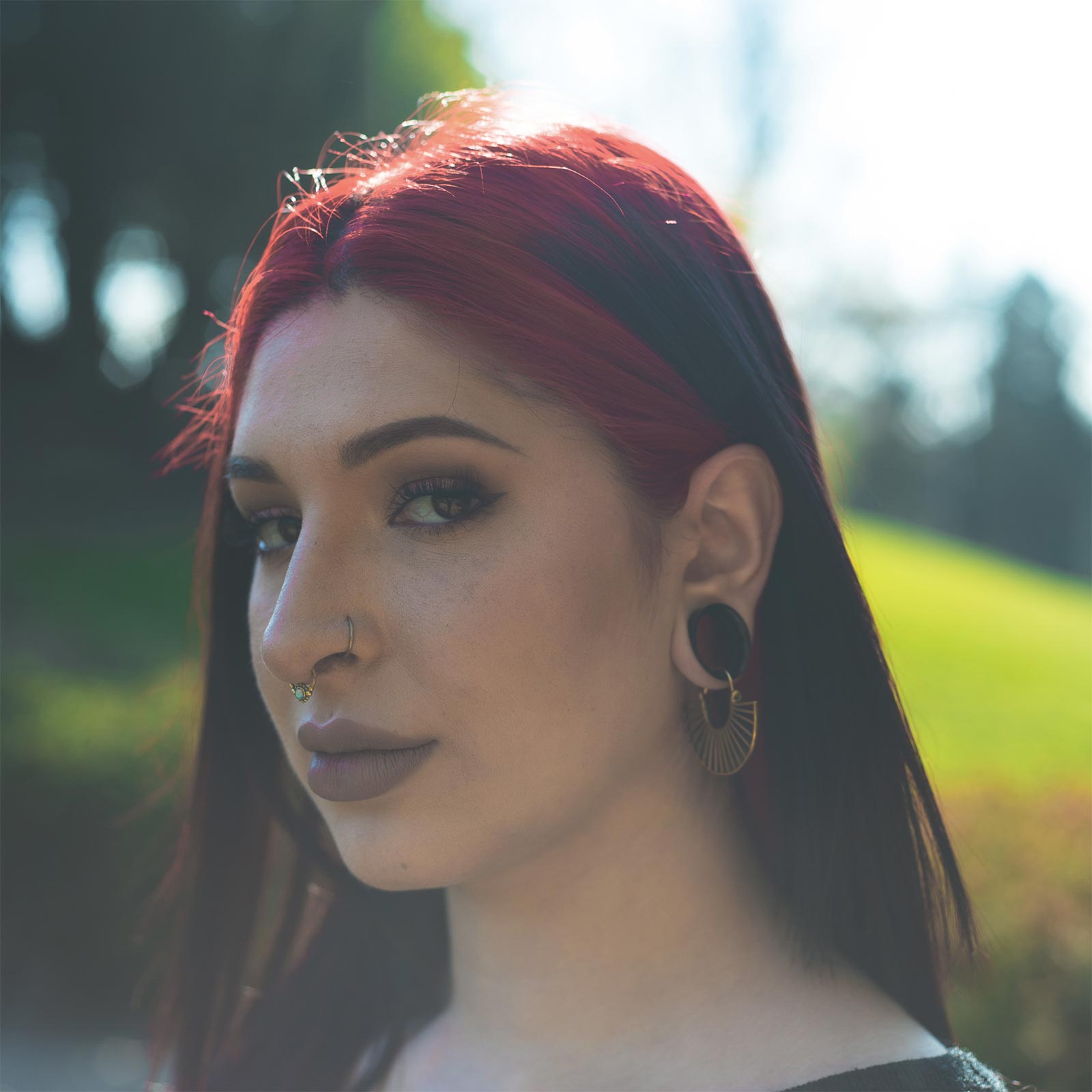 Emperor Kuzco Brass Plug Hoops Model Shot