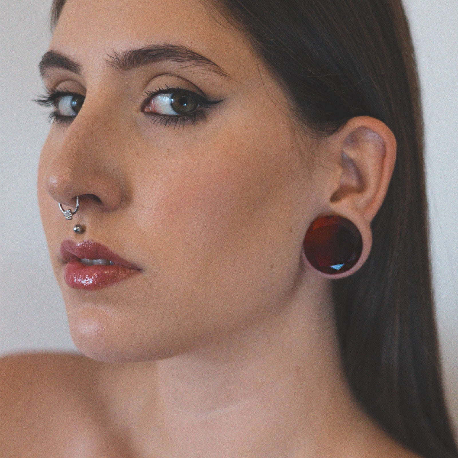 Faceted Red Glass Double Flare Plug Model Shot