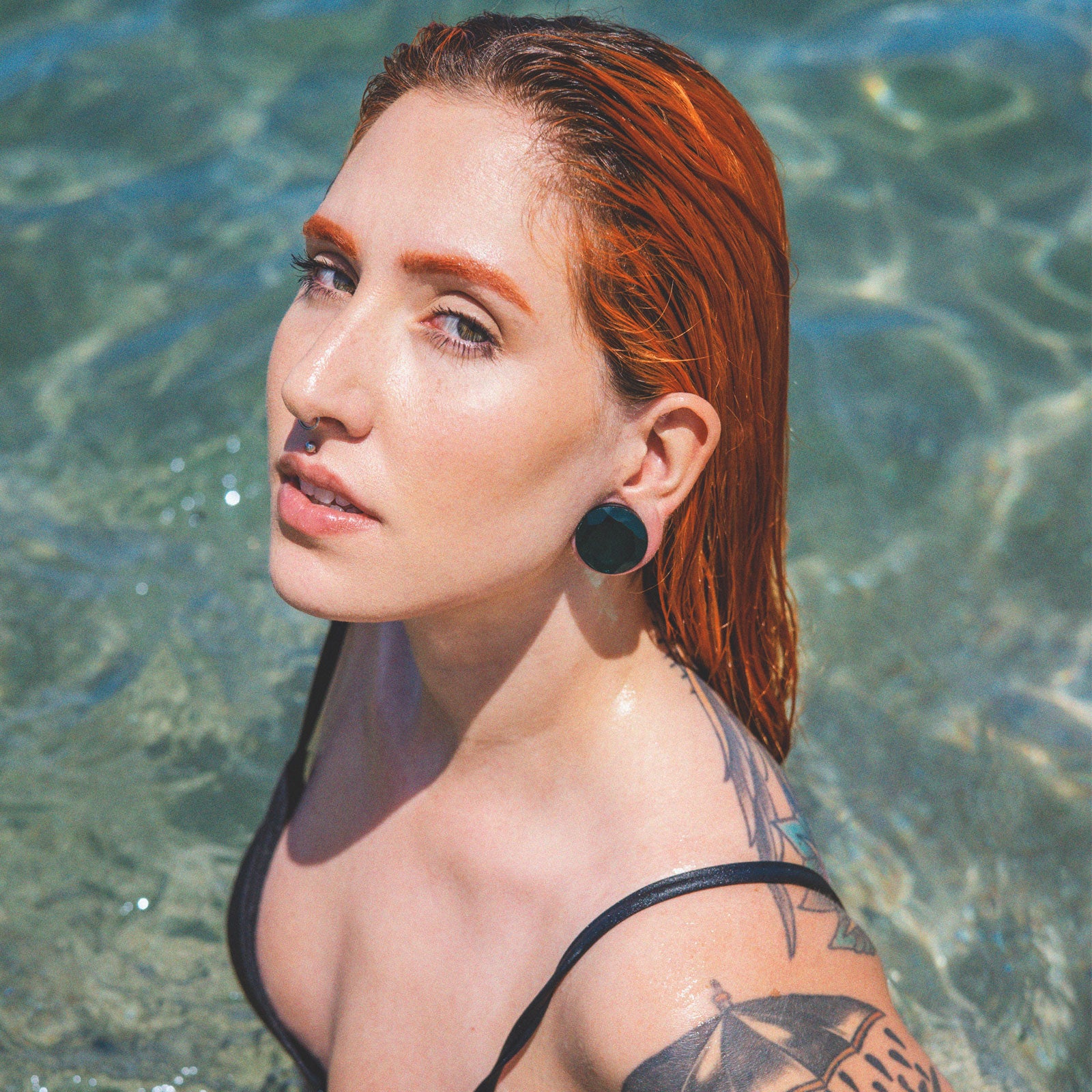 Faceted Teal Glass Double Flare Plug Model Shot Kate