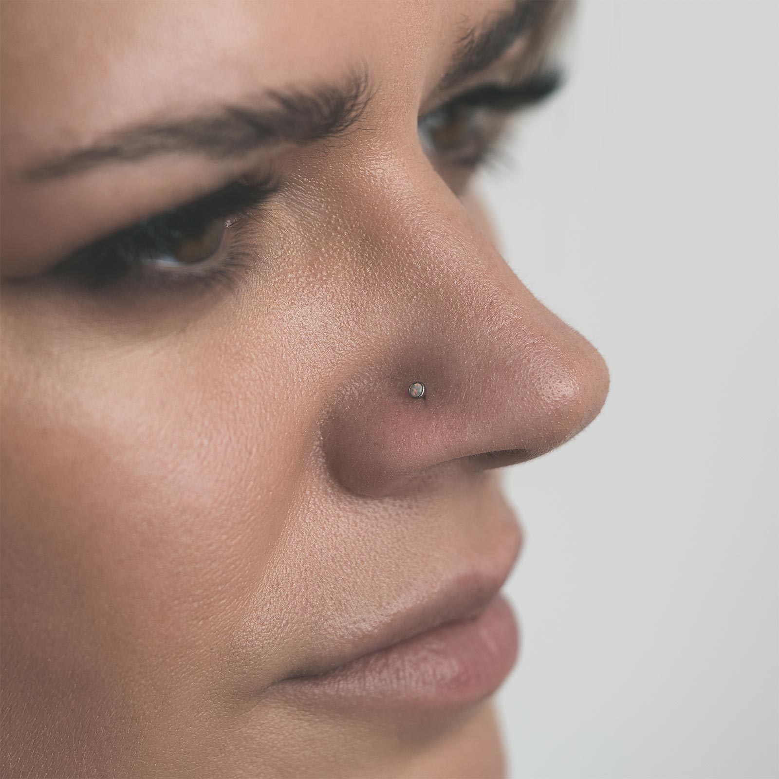 Fire & Snow Synth Opal Titanium Threadless Top Model Shot