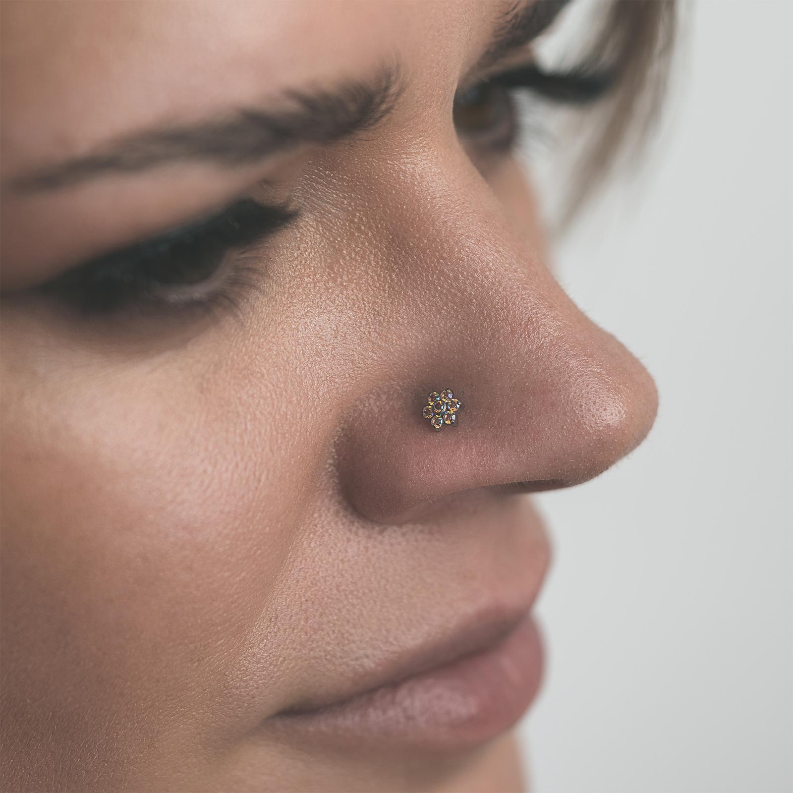 Flower Shape Aurora Borealis Bejewelled Titanium Threadless Top Model Shot