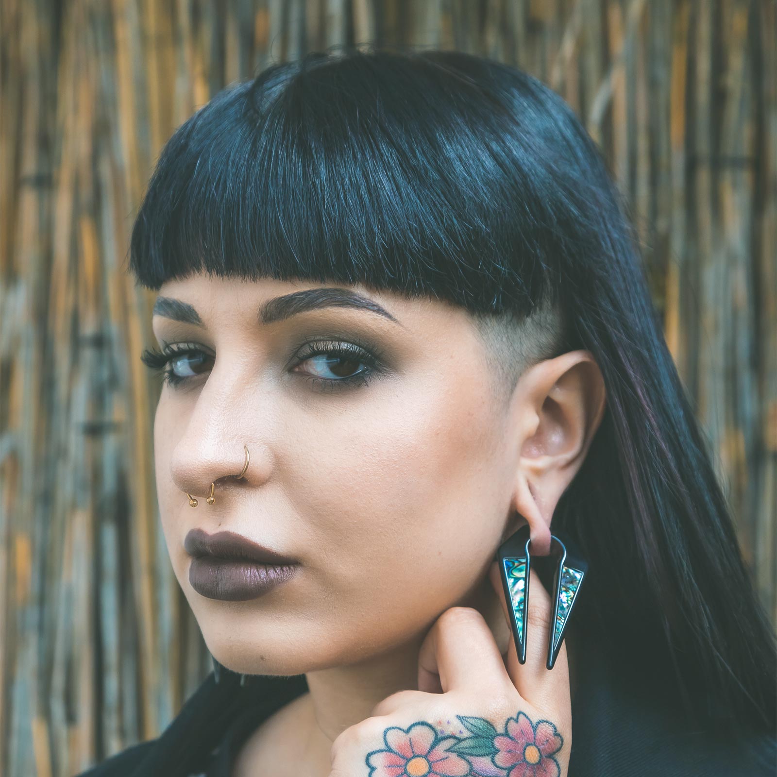 Geometric Keyhole Shell & Black PVD Ear Weight Model Shot