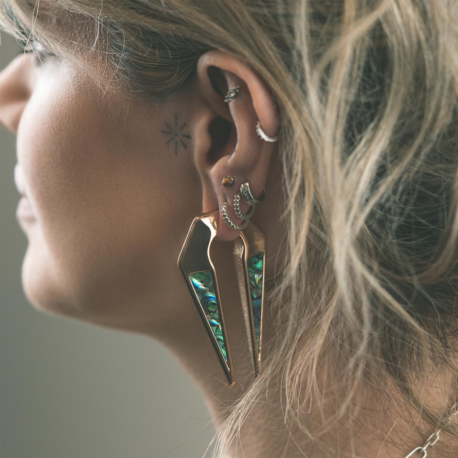 Geometric Keyhole Shell & Rose Gold PVD Ear Weight Model Shot