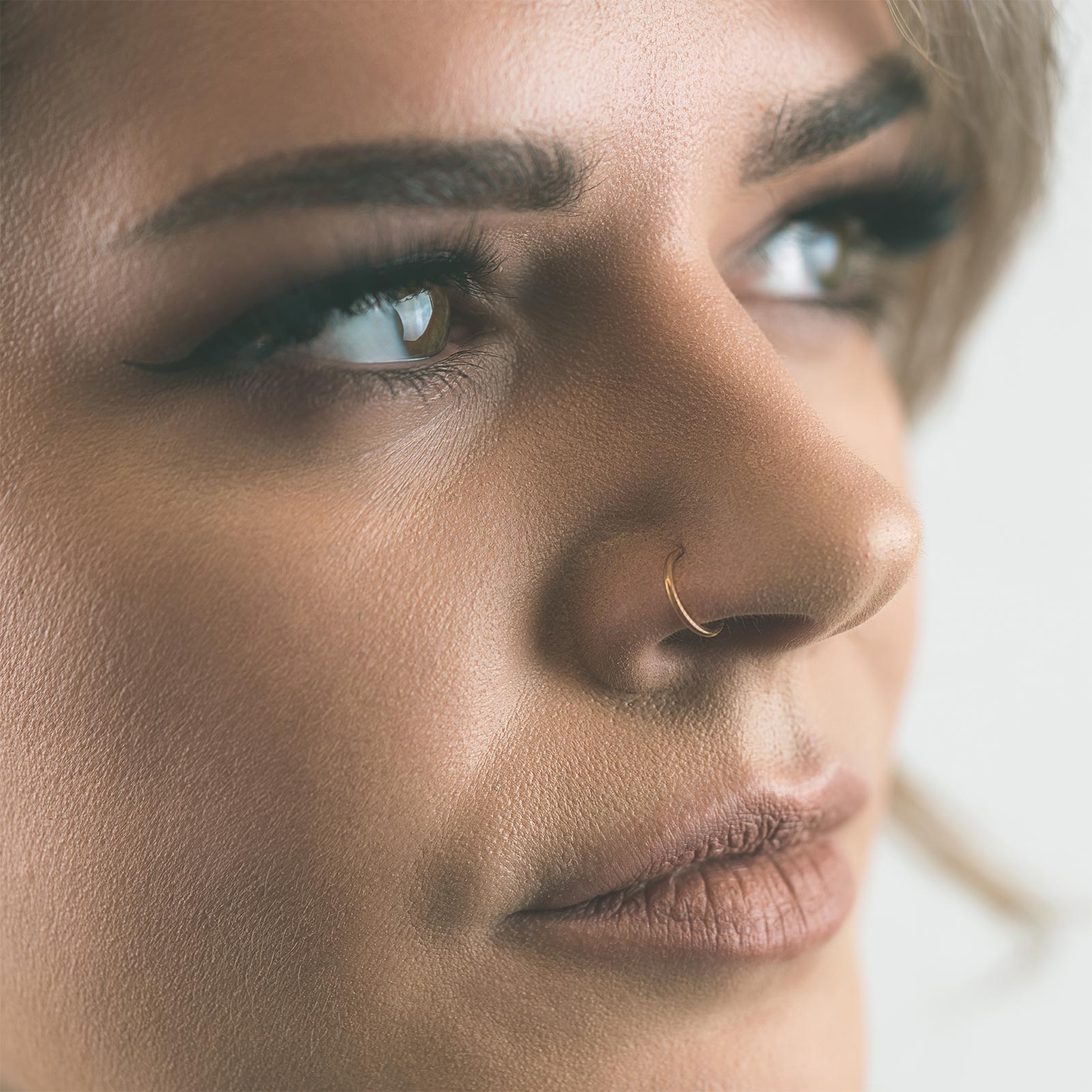 Gold PVD Titanium Seamless Nose Ring Model Shot