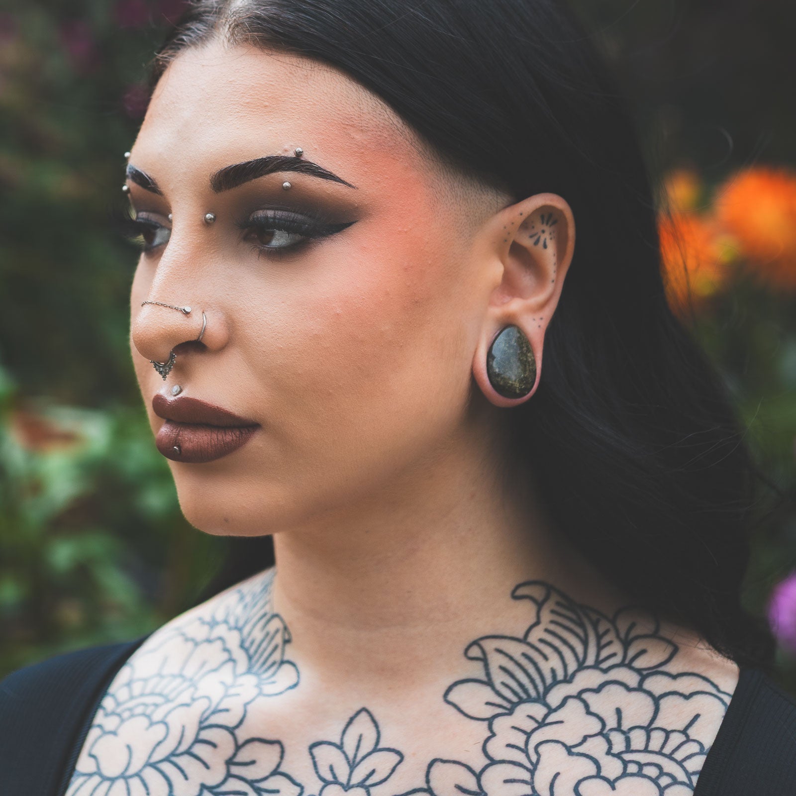 Golden Obsidian Double Flare Convex Teardrop Plug Model Shot