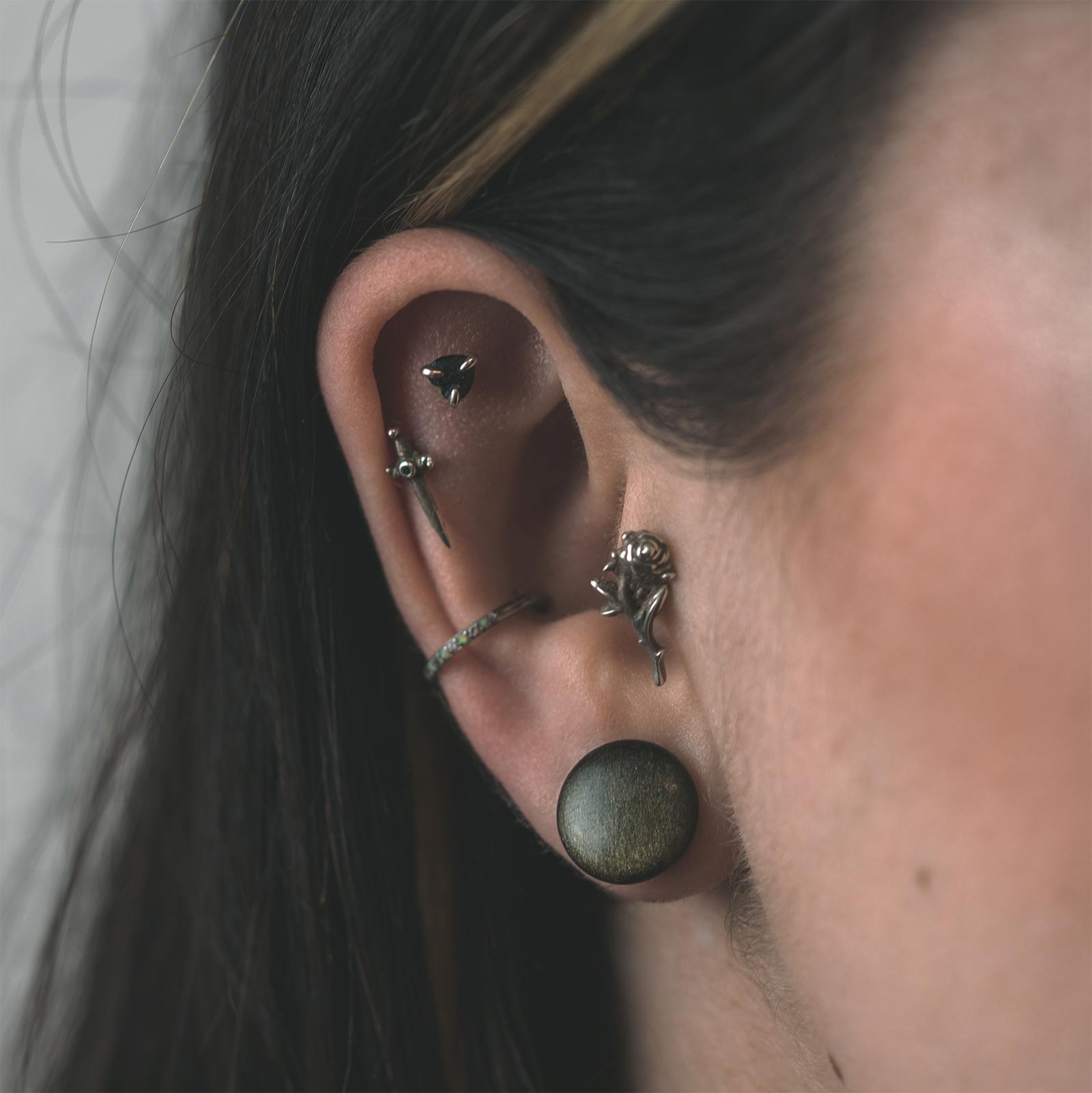 Golden Obsidian Single Flare Convex Stone Plug Model Shot