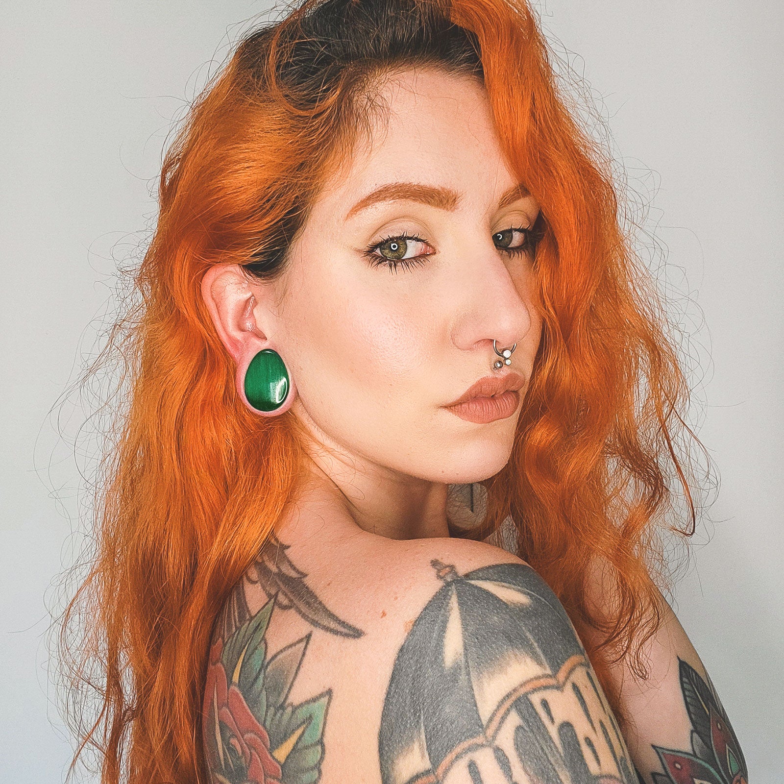 Green Cat's Eye Double Flare Glass Teardrop Plug Model Shot