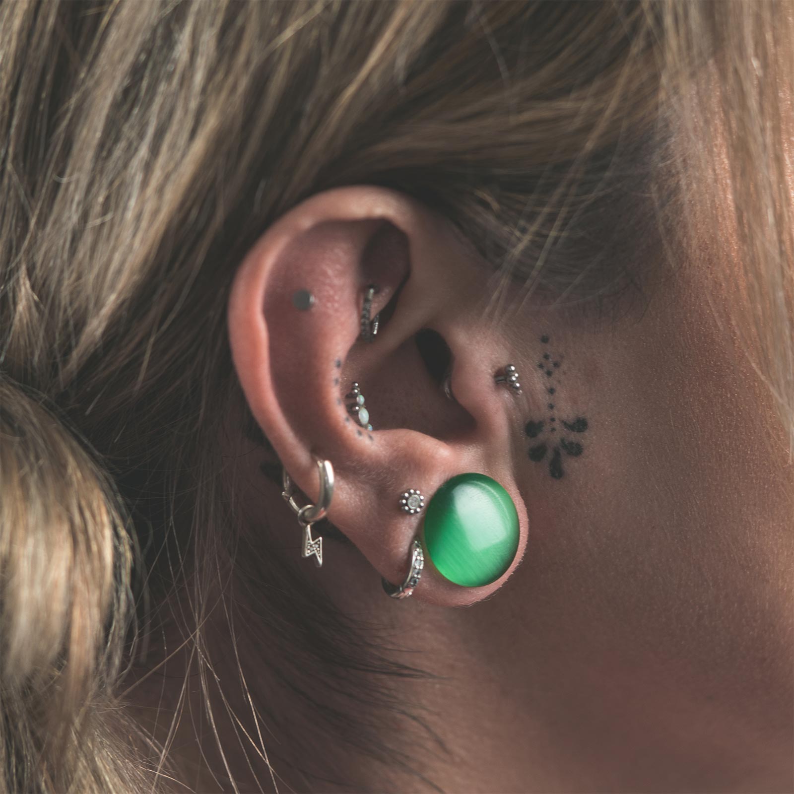 Green Cat's Eye Glass Single Flare Convex Plug Model Shot Side Shot