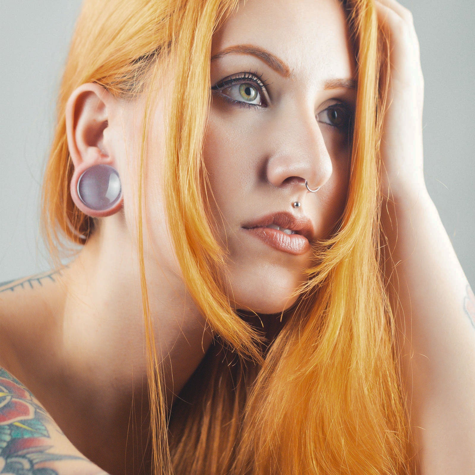 Grey Cat's Eye Glass Double Flare Concave Plug Model Shot