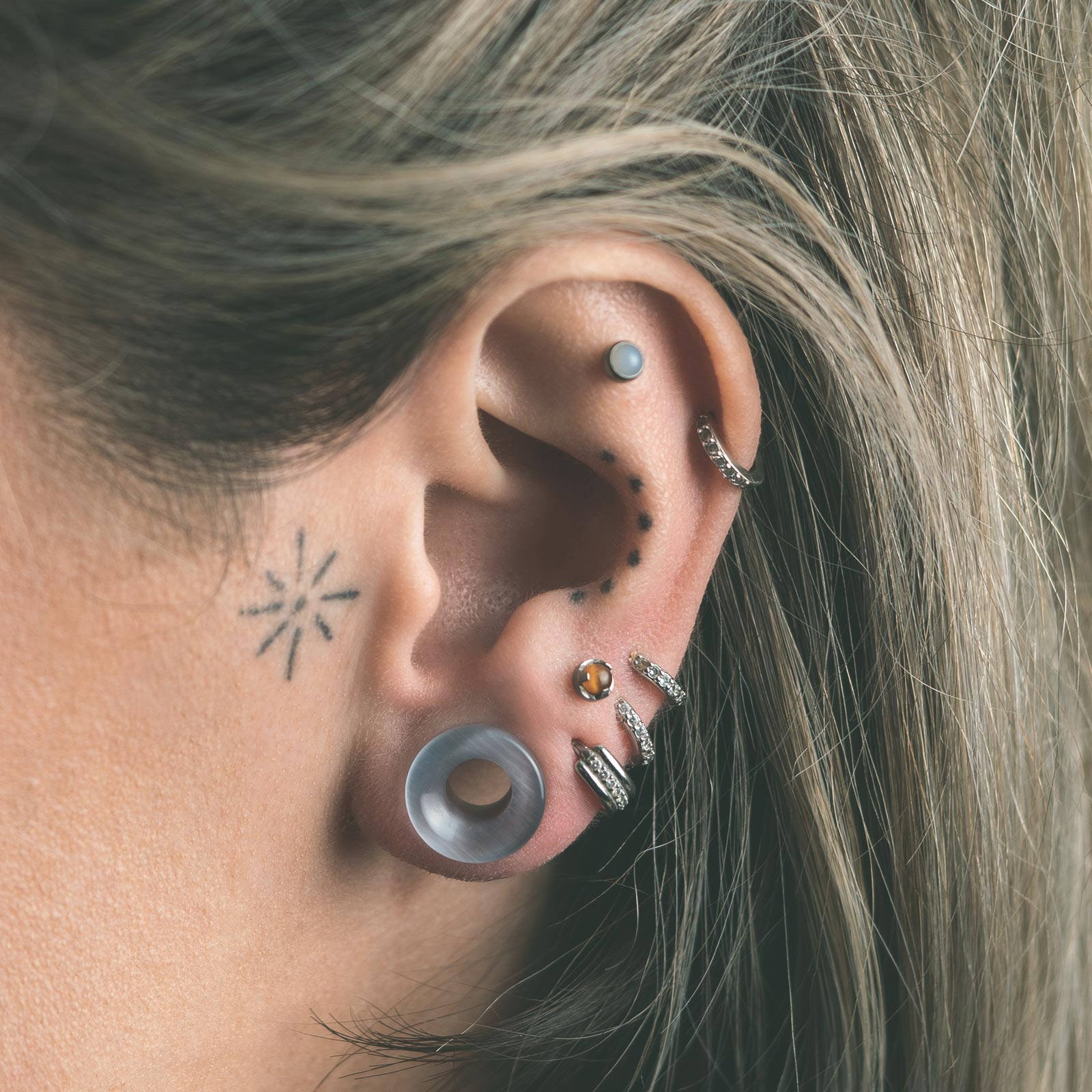 Grey Cat's Eye Glass Double Flare Concave Tunnel Model Shot