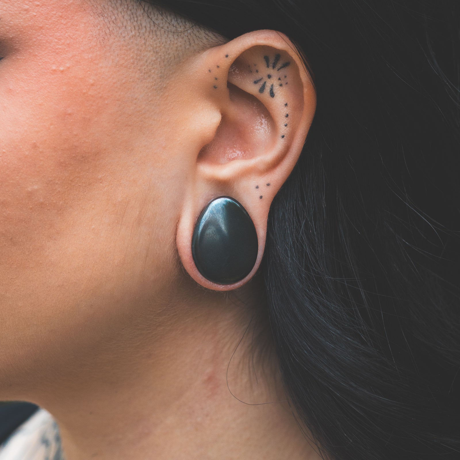 Hematite Double Flare Convex Teardrop Plug Model Shot