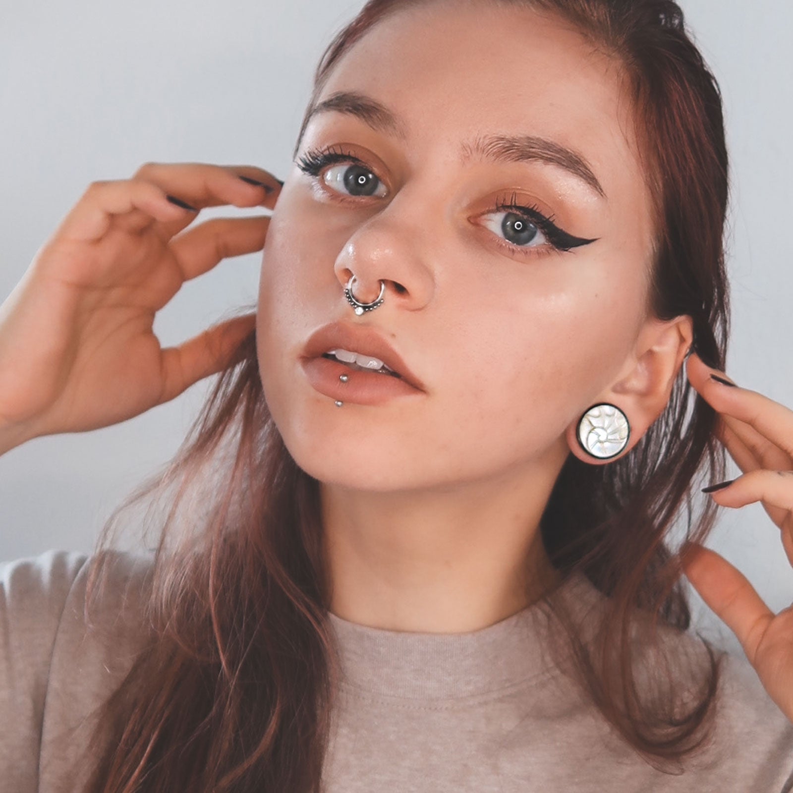 Horn Double Flare Plug With Ammonite MOP Carving Inlay Model Shot