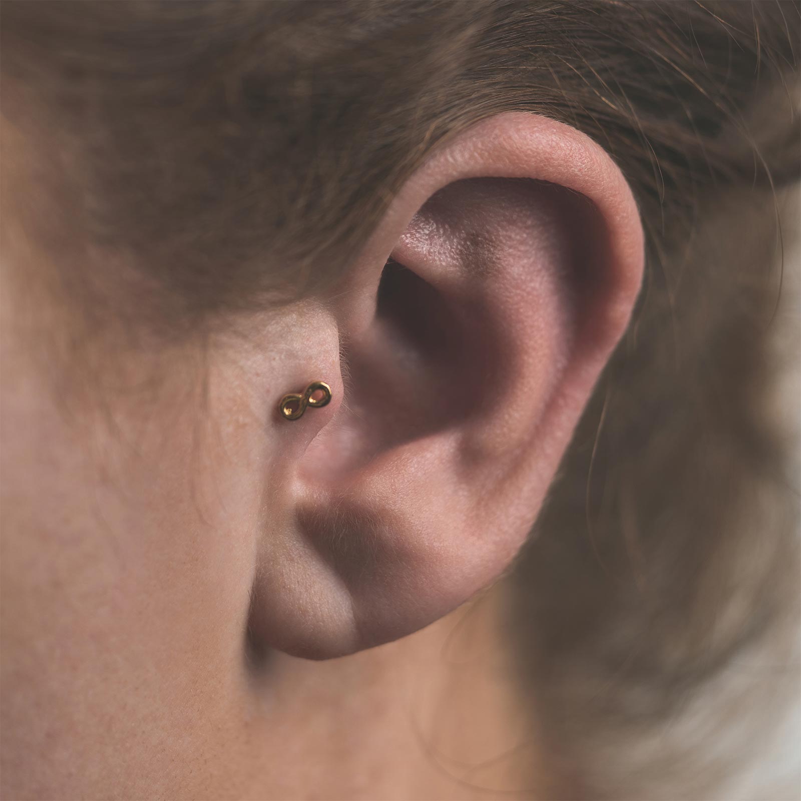 Infinity Symbol 18k Gold Plated Threadless Top Model Shot