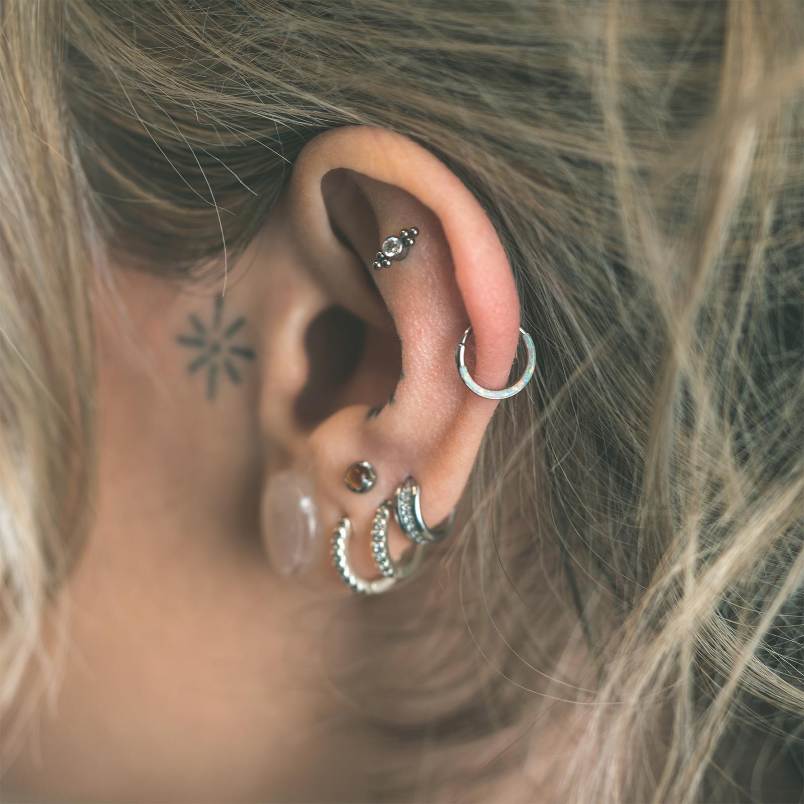 Inlaid Fire & Snow Synth Opal Titanium Earring Model Shot