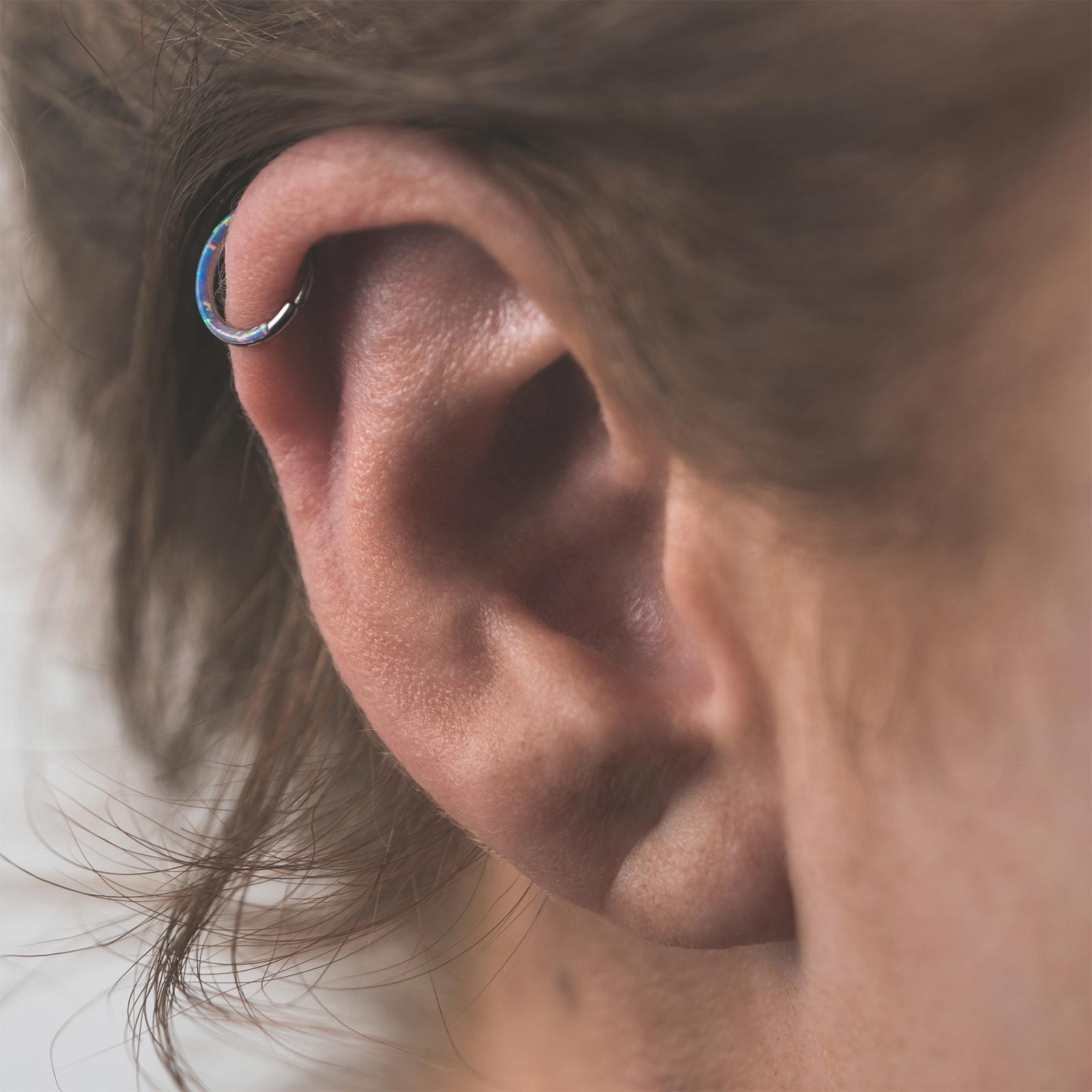 Inlaid Flash Lavender Synth Opal Titanium Earring Model Shot