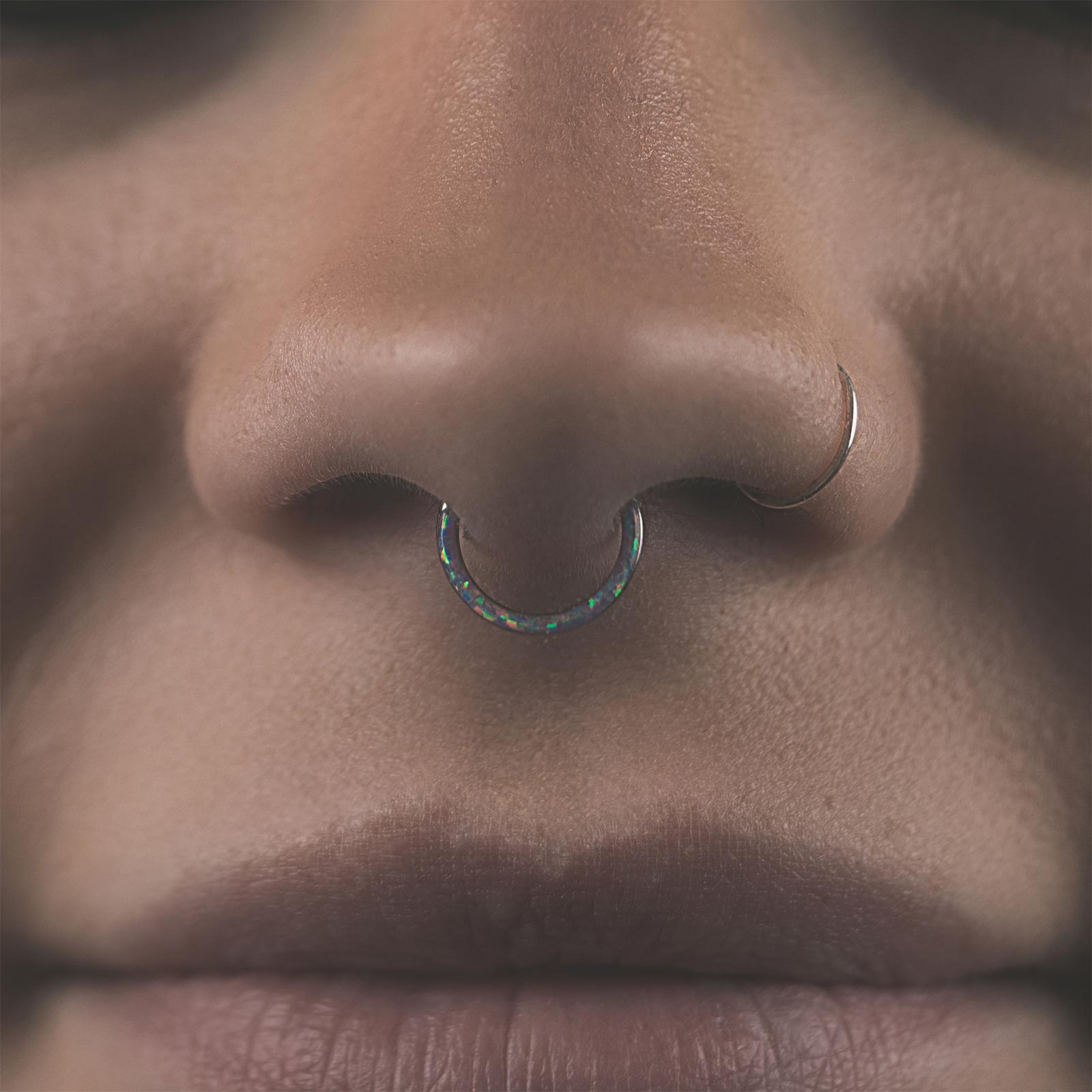 Inlaid Flash Lavender Synth Opal Titanium Septum Clicker Model Shot