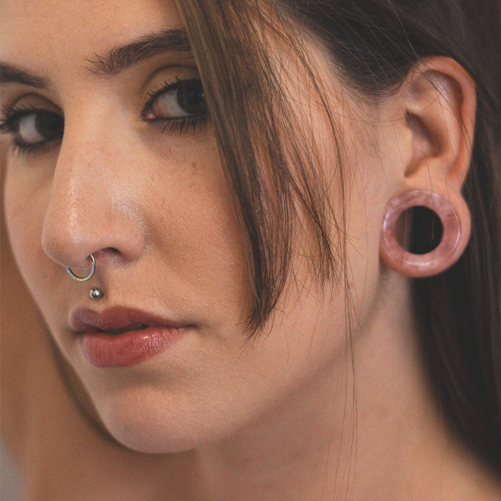 Inlaid Pink & Yellow Synth Opal Titanium Septum Clicker Model Shot