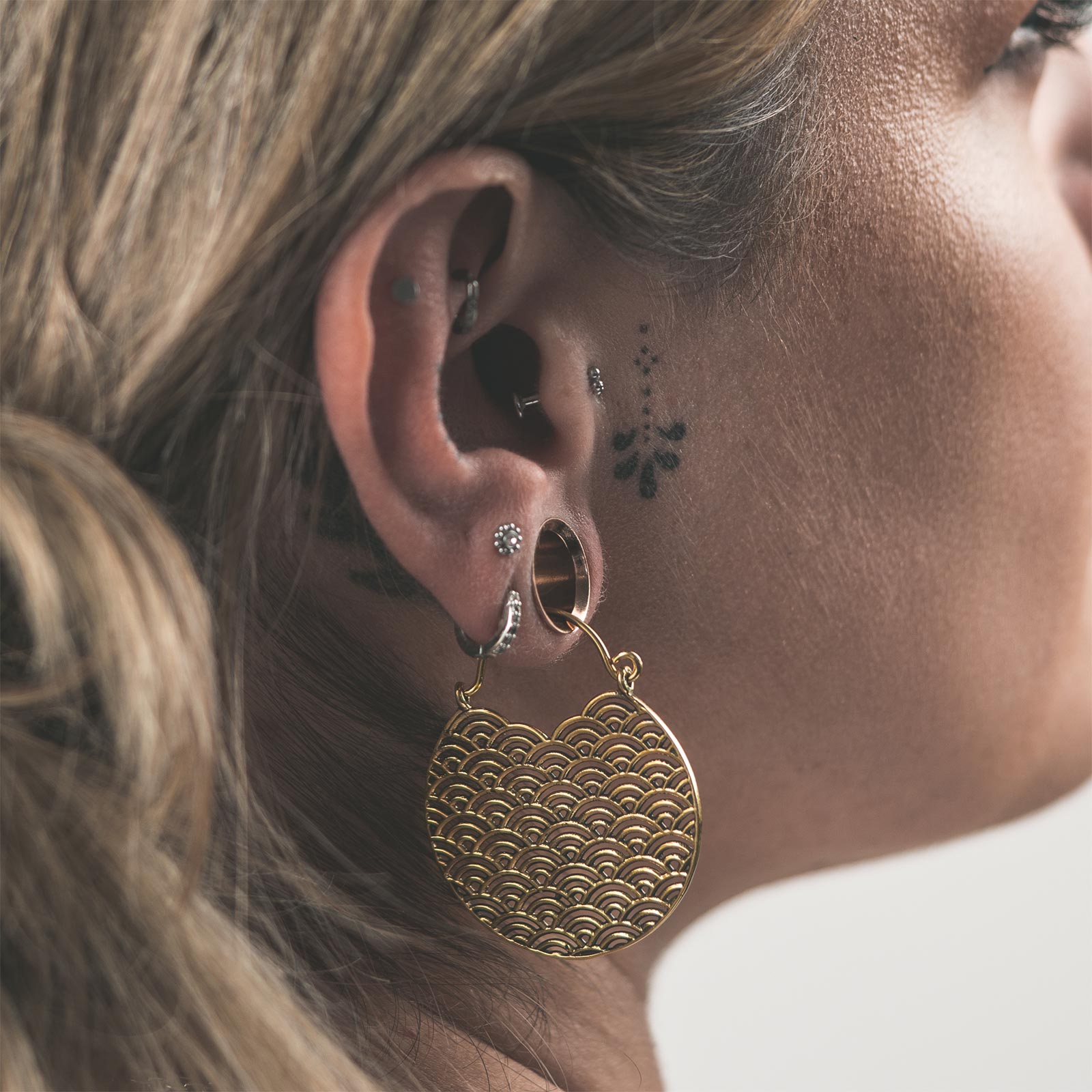 Japanese Wave Brass Plug Hoops Model Shot