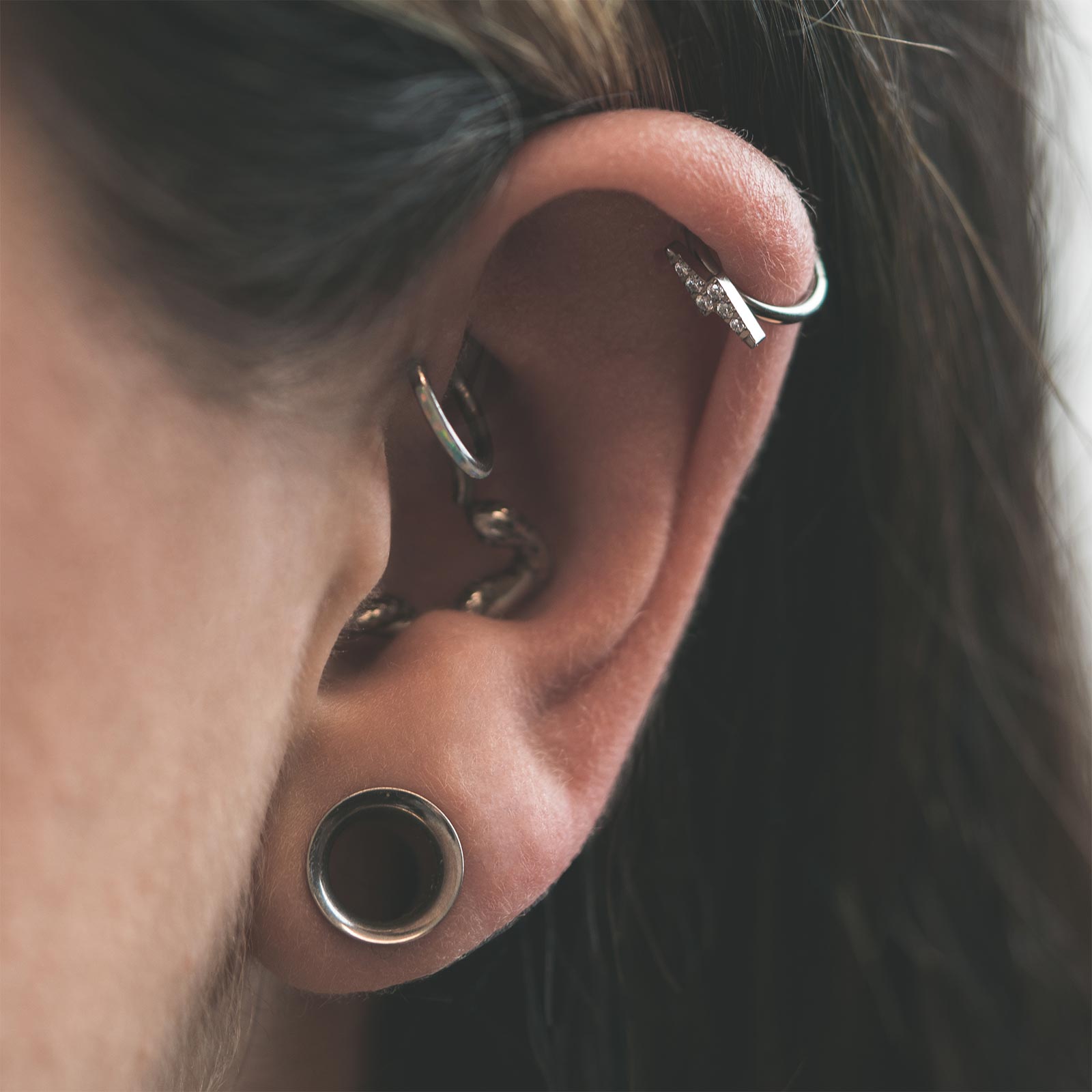 Lightning Bolt Bejewelled Titanium Hinged Segment Ring Model Shot