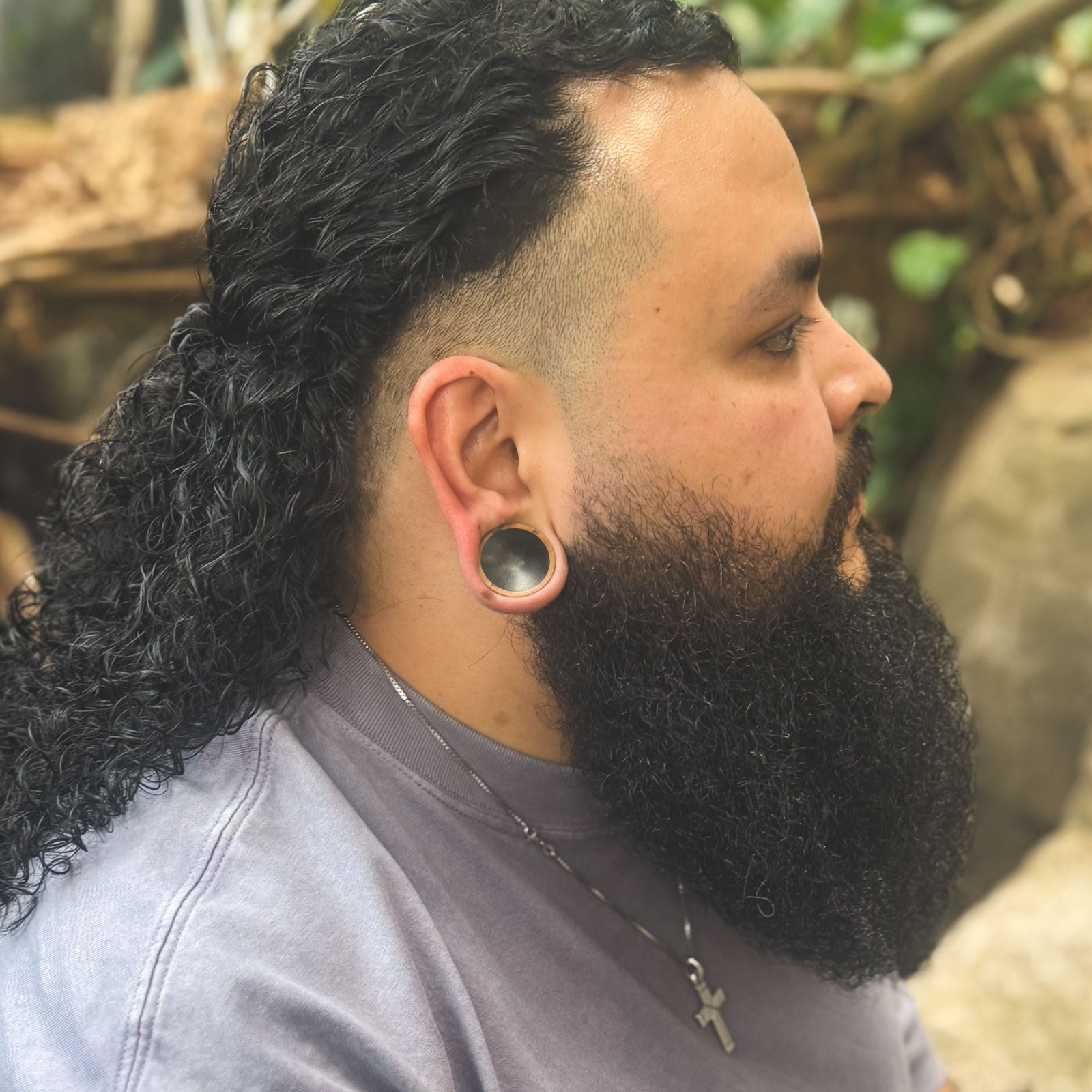 Olive Wood Double Flare Concave Plug With Black Areng Wood Inlay Model Shot