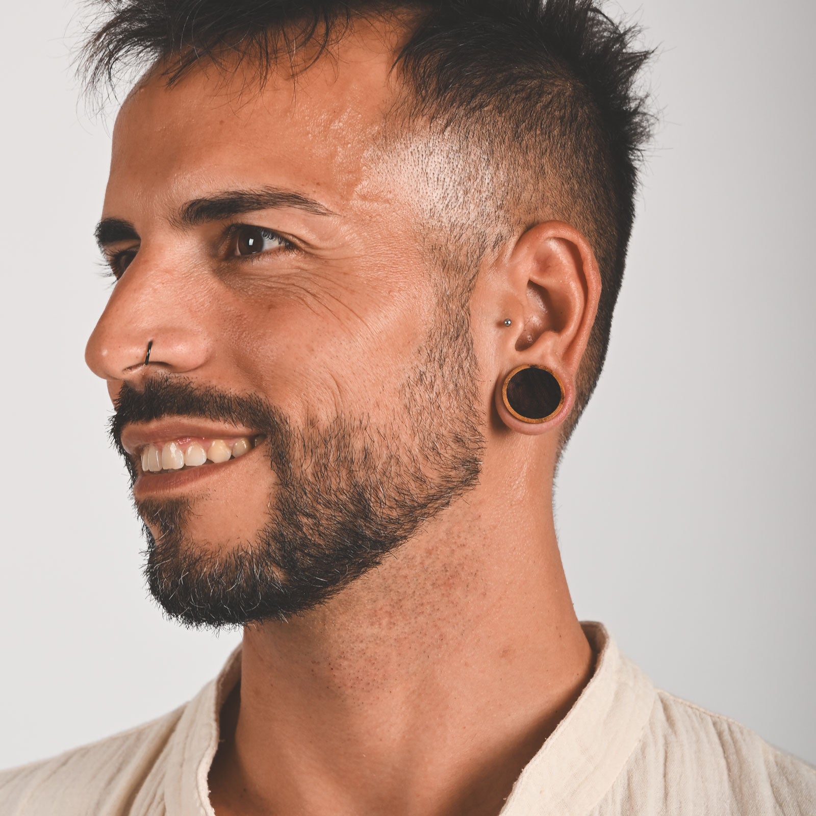 Olive Wood Double Flare Concave Plug With Sono Wood Inlay Model Shot