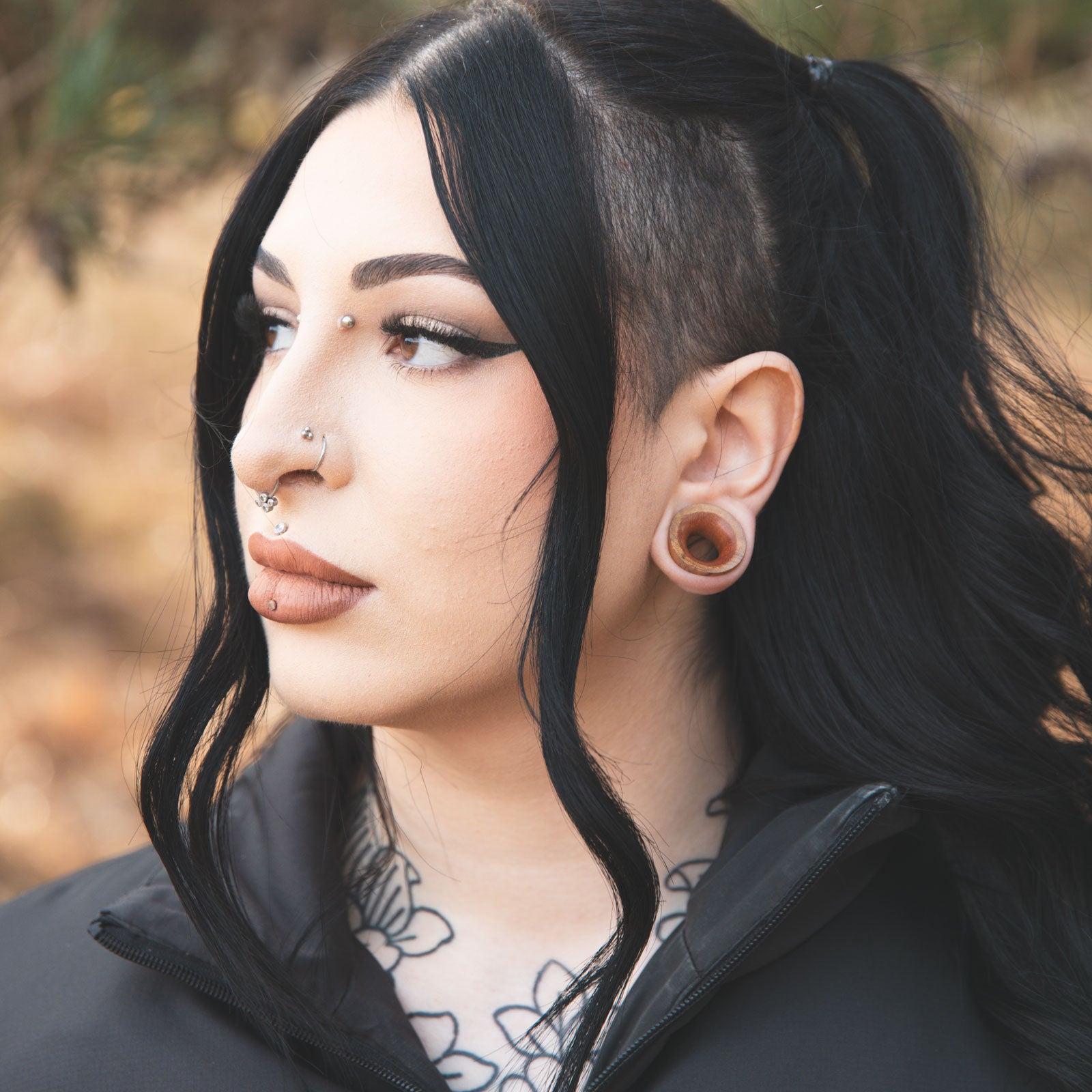 Olive Wood Double Flare Concave Tunnel With Saba Wood Inlay Model Shot