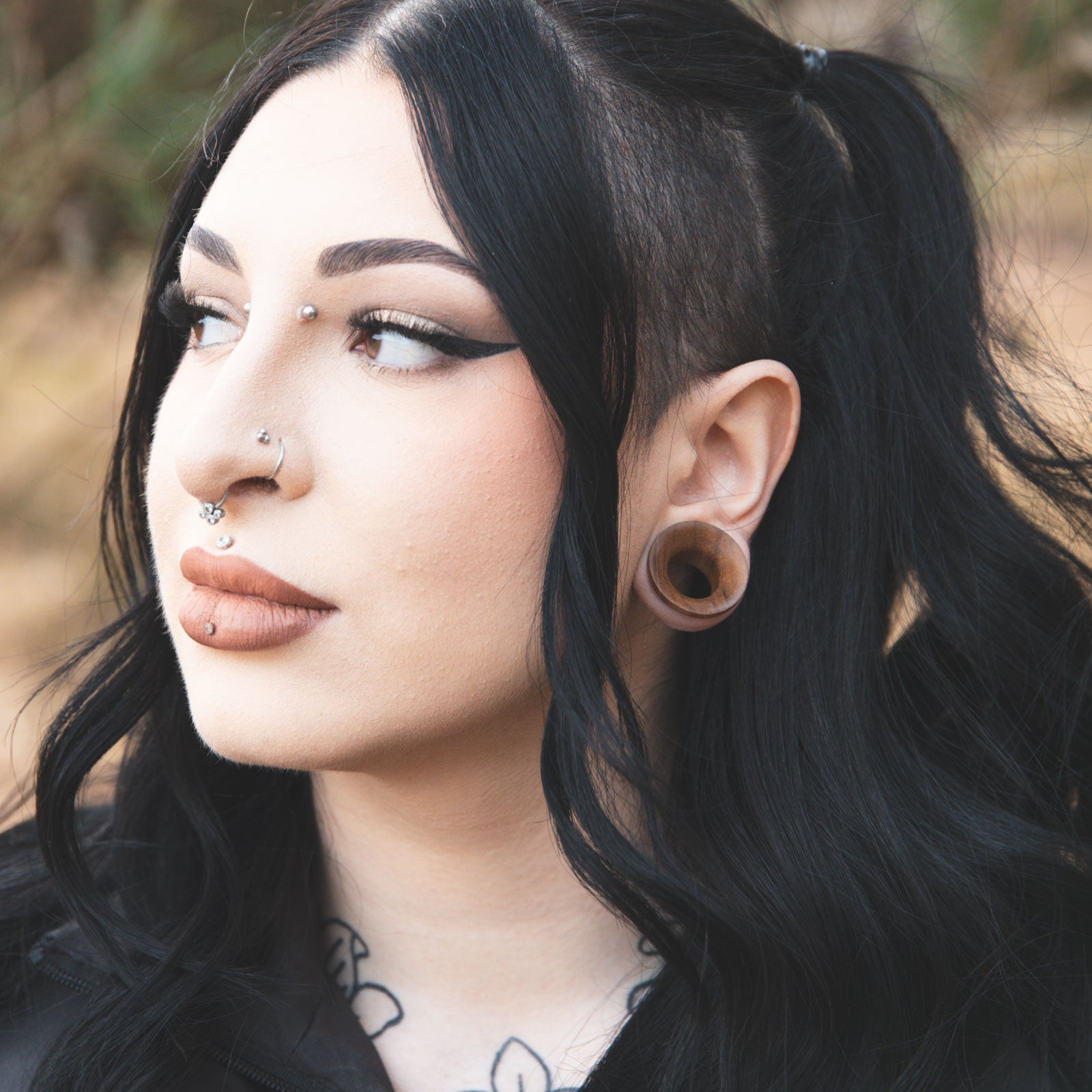 Olive Wood Single Flare Concave Tunnel Model Shot